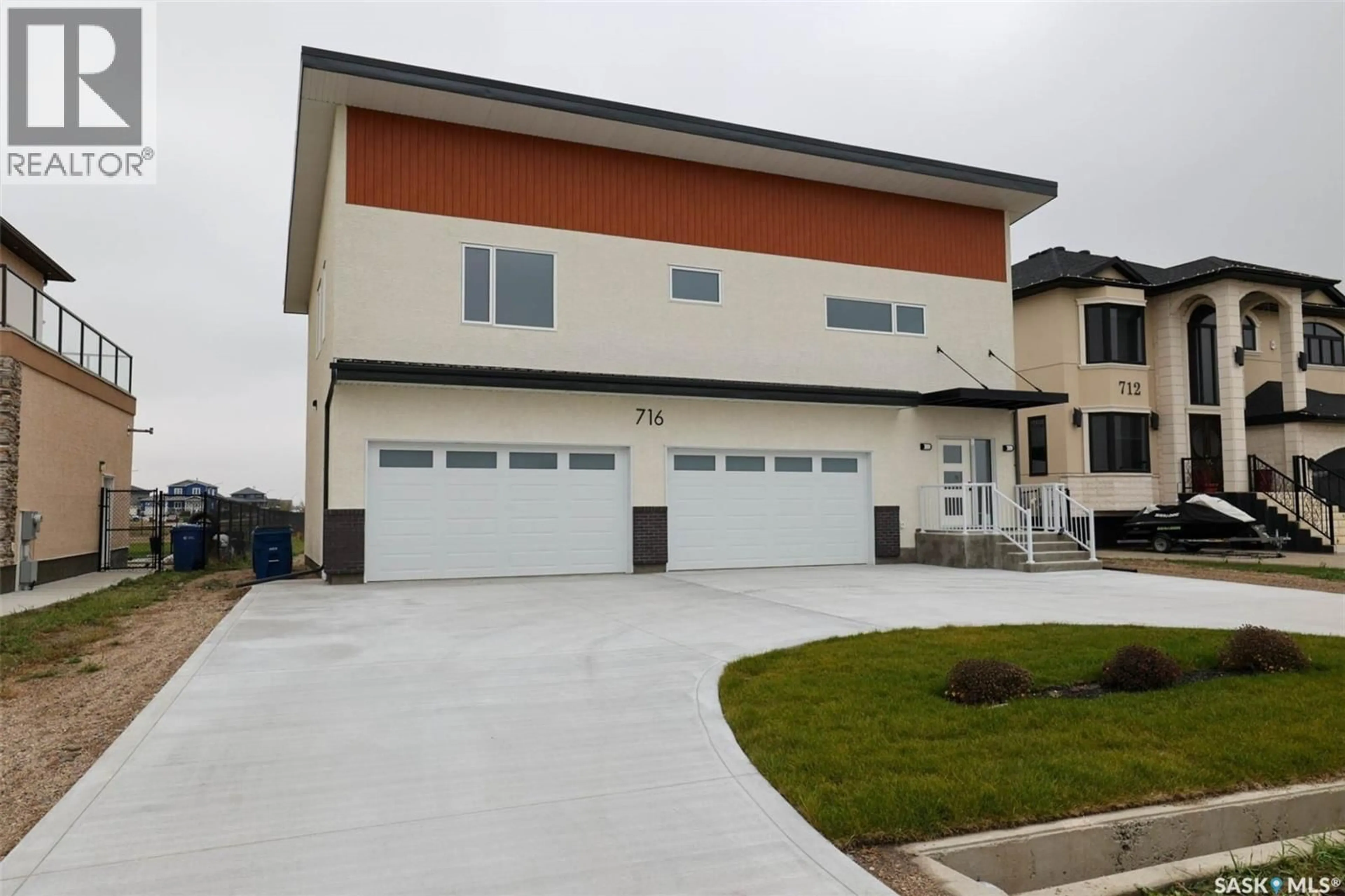 Home with vinyl exterior material, street for 716 EMERALD PARK ROAD, Edenwold Rm No.158 Saskatchewan S4L0C4