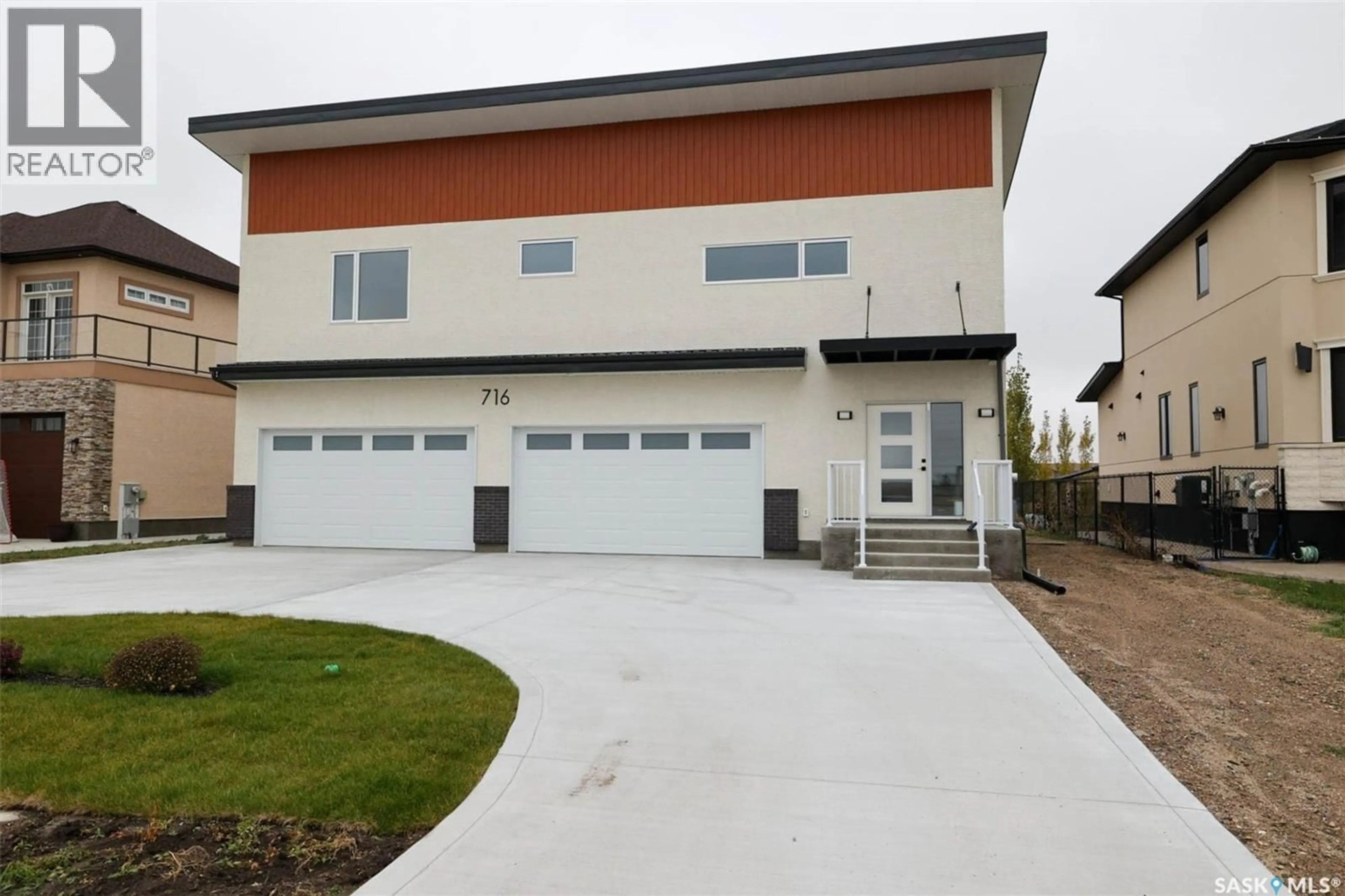 Home with vinyl exterior material, street for 716 EMERALD PARK ROAD, Edenwold Rm No.158 Saskatchewan S4L0C4