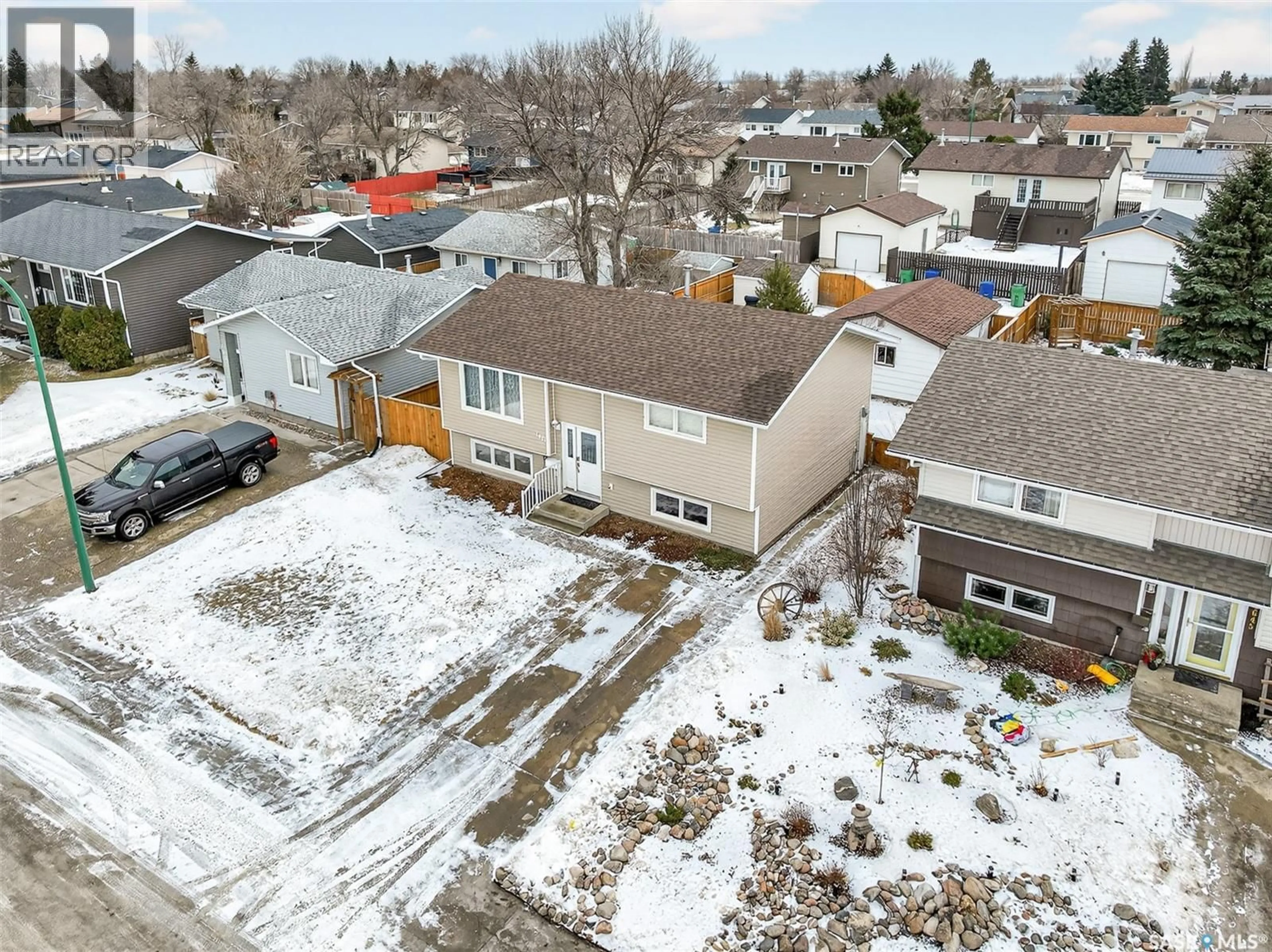 A pic from outside/outdoor area/front of a property/back of a property/a pic from drone, street for 1641 SMITH STREET, Moose Jaw Saskatchewan S6K1A7