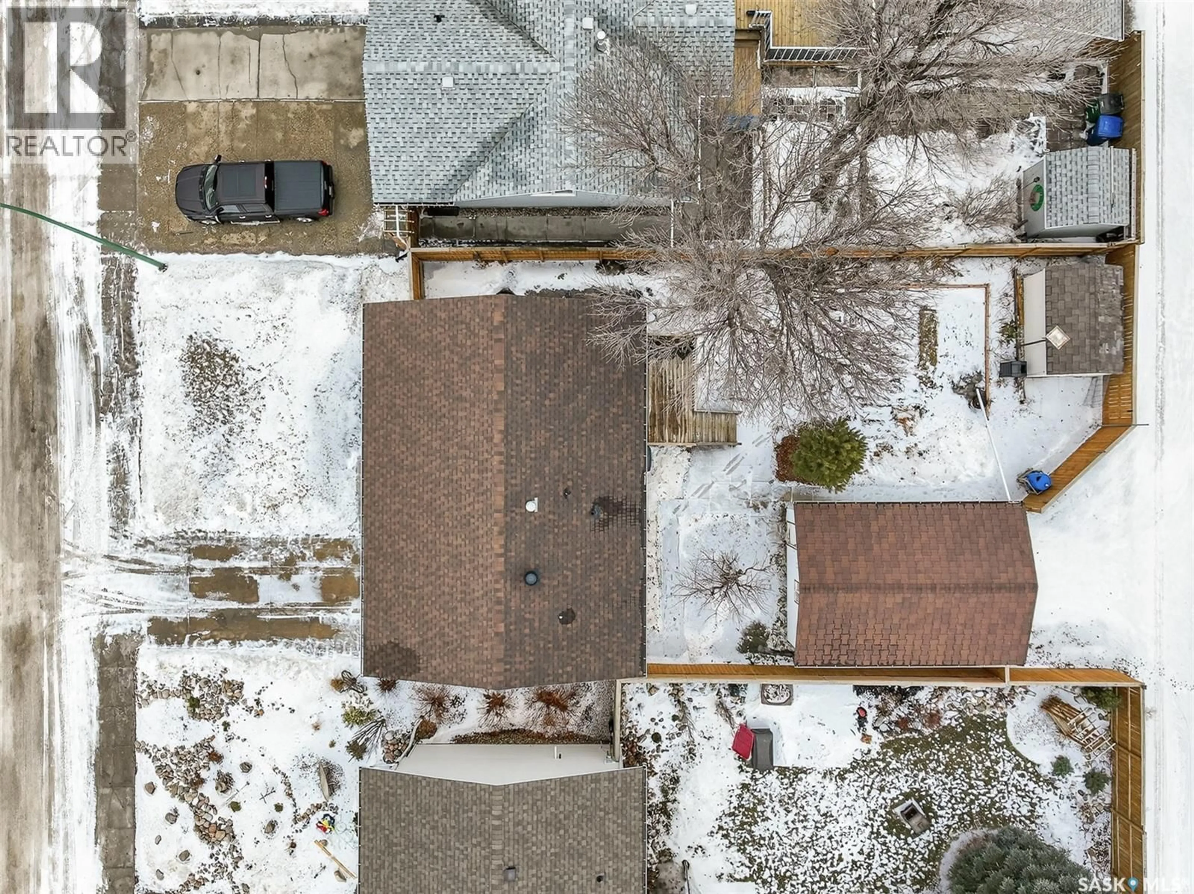 A pic from outside/outdoor area/front of a property/back of a property/a pic from drone, street for 1641 SMITH STREET, Moose Jaw Saskatchewan S6K1A7