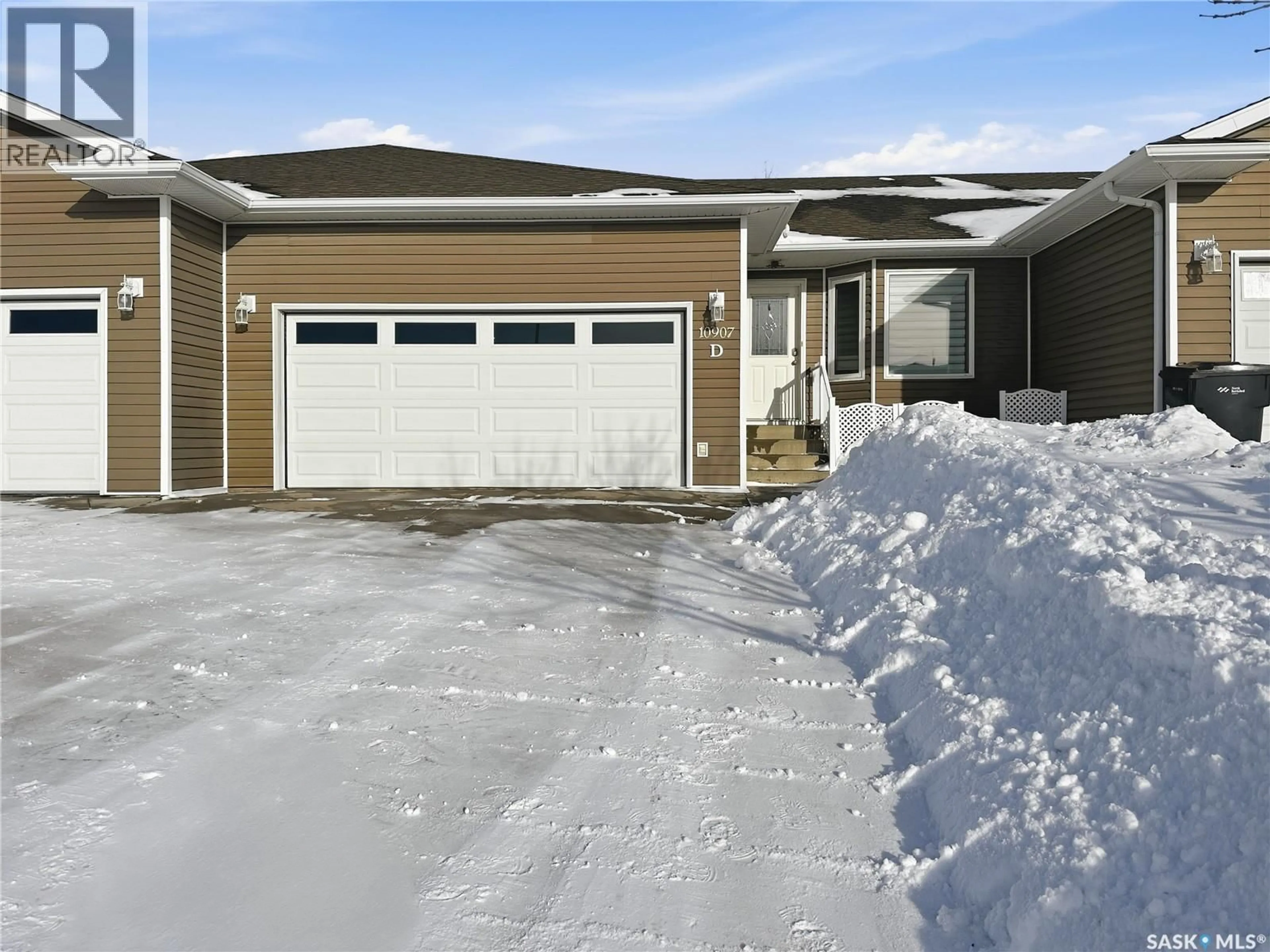 Home with vinyl exterior material, street for D - 10907 AMOS DRIVE, North Battleford Saskatchewan S9A0S6