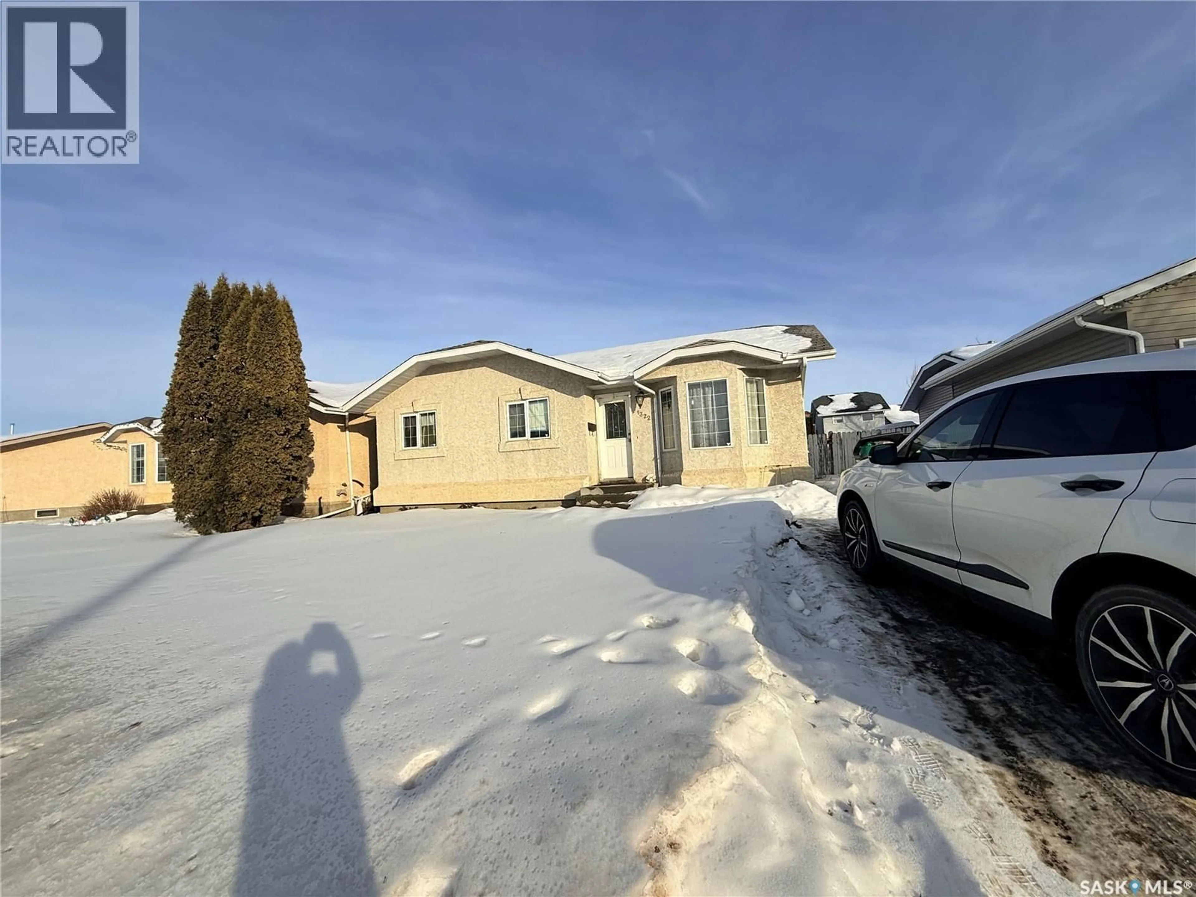 A pic from outside/outdoor area/front of a property/back of a property/a pic from drone, street for 1322 JUNOR AVENUE, Saskatoon Saskatchewan S7L7K1