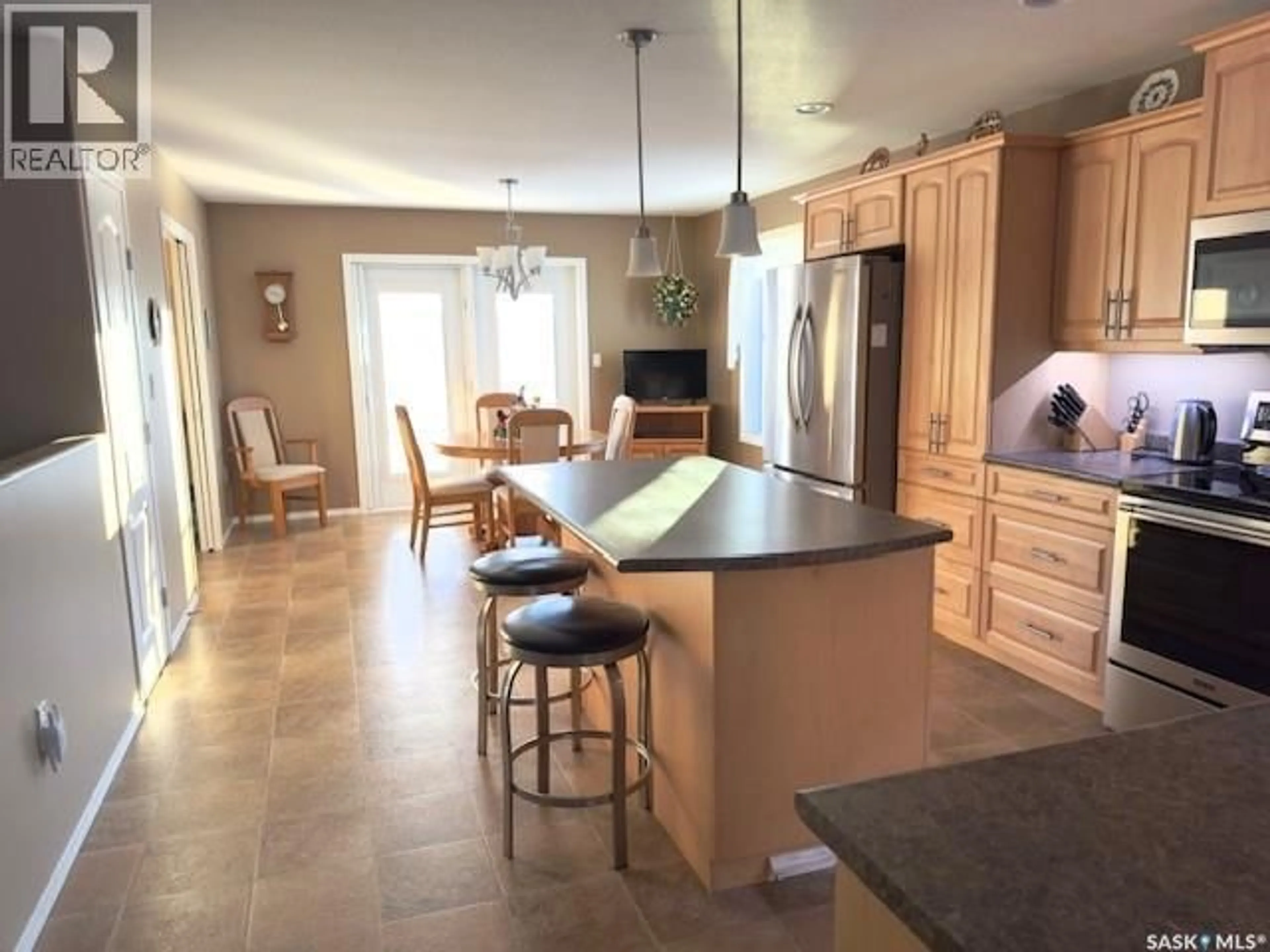Open concept kitchen, ceramic/tile floor for 2406A HENDERSON DRIVE, North Battleford Saskatchewan S9A3T5