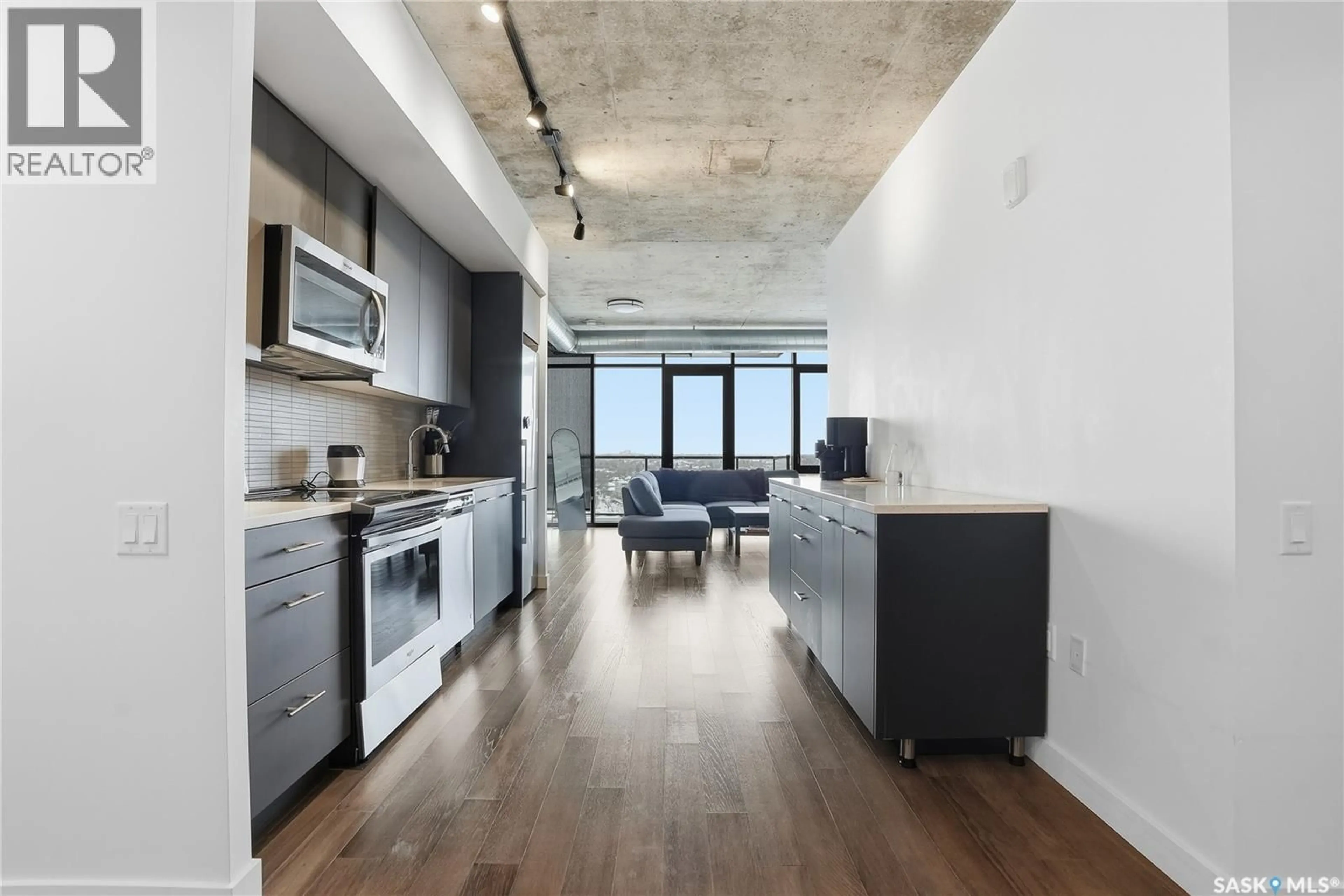 Open concept kitchen, cement floor for S - 1302 490 2ND AVENUE, Saskatoon Saskatchewan S7K4H5