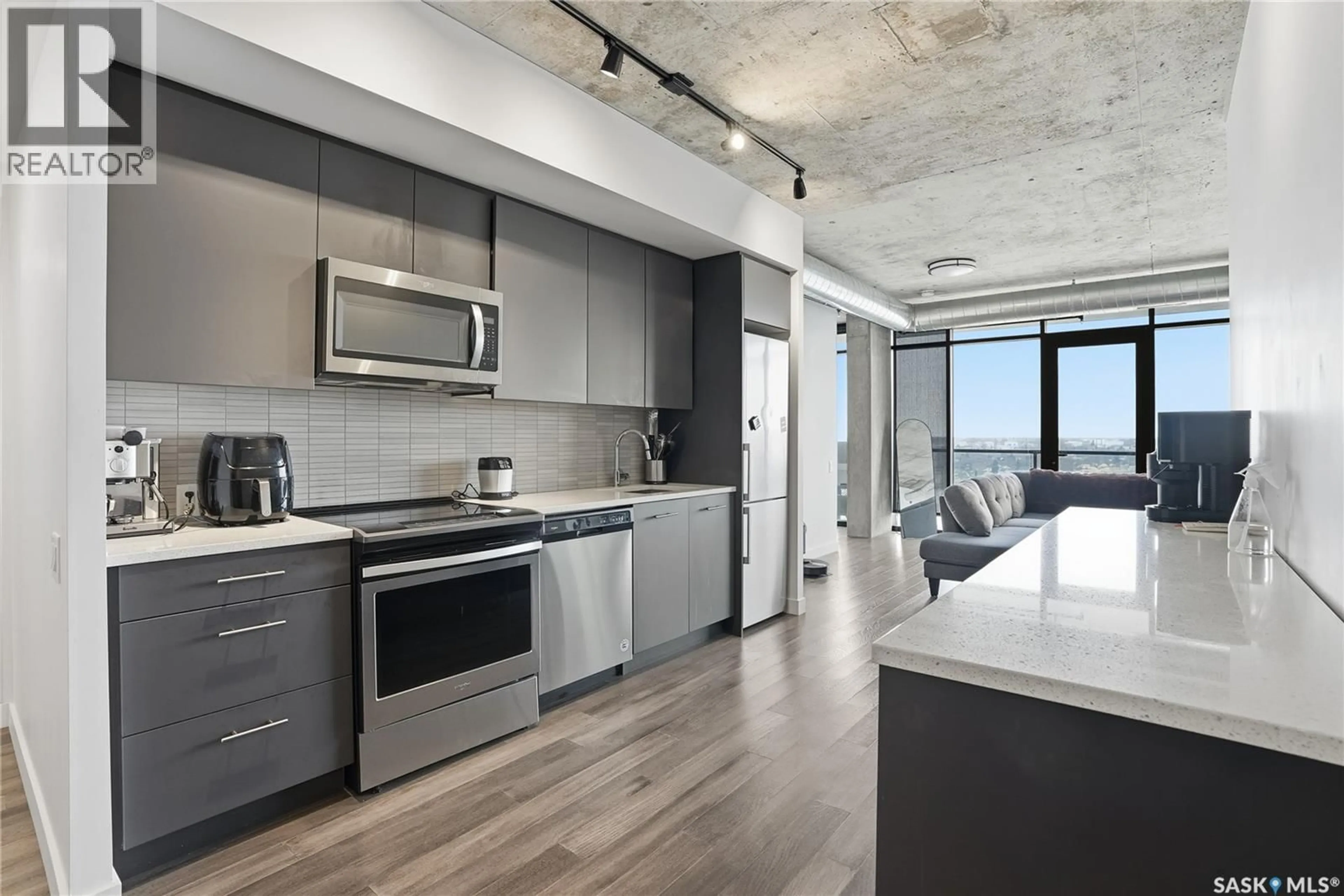 Open concept kitchen, cement floor for S - 1302 490 2ND AVENUE, Saskatoon Saskatchewan S7K4H5