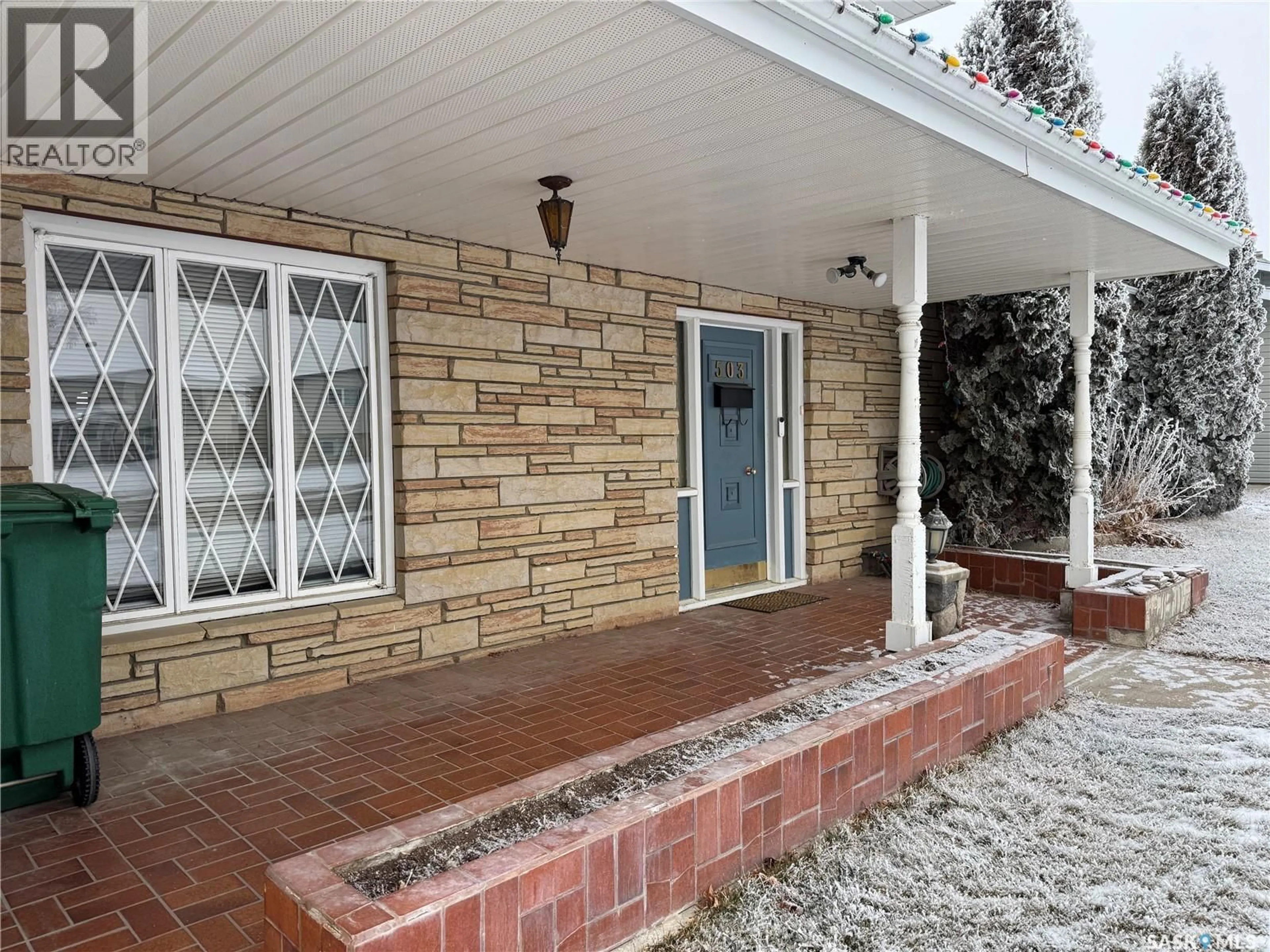 Home with brick exterior material, street for 503 7TH AVENUE, Biggar Saskatchewan S0K0M0