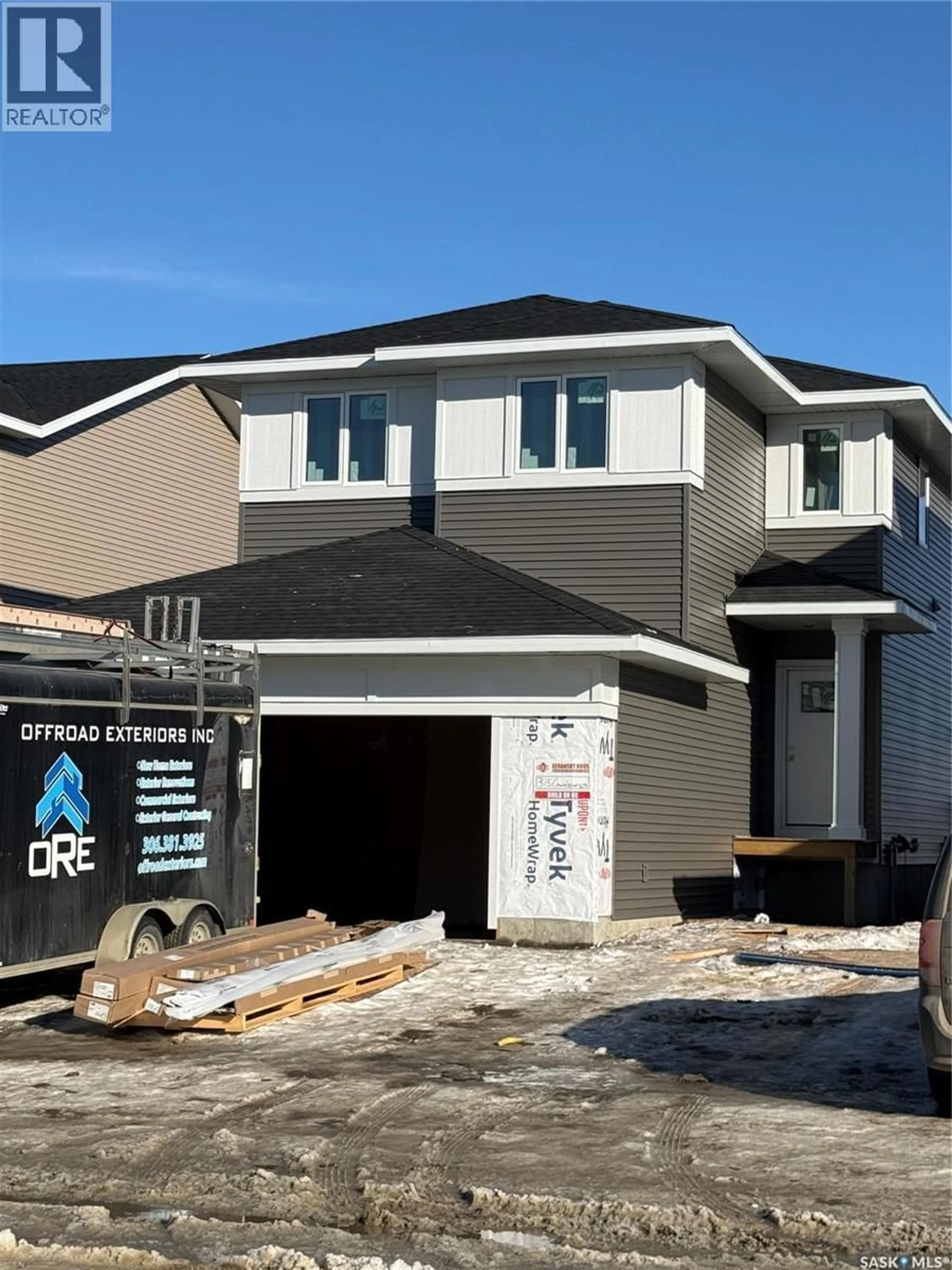Home with vinyl exterior material, street for 315 COWESSESS ROAD, Saskatoon Saskatchewan S7K1M3