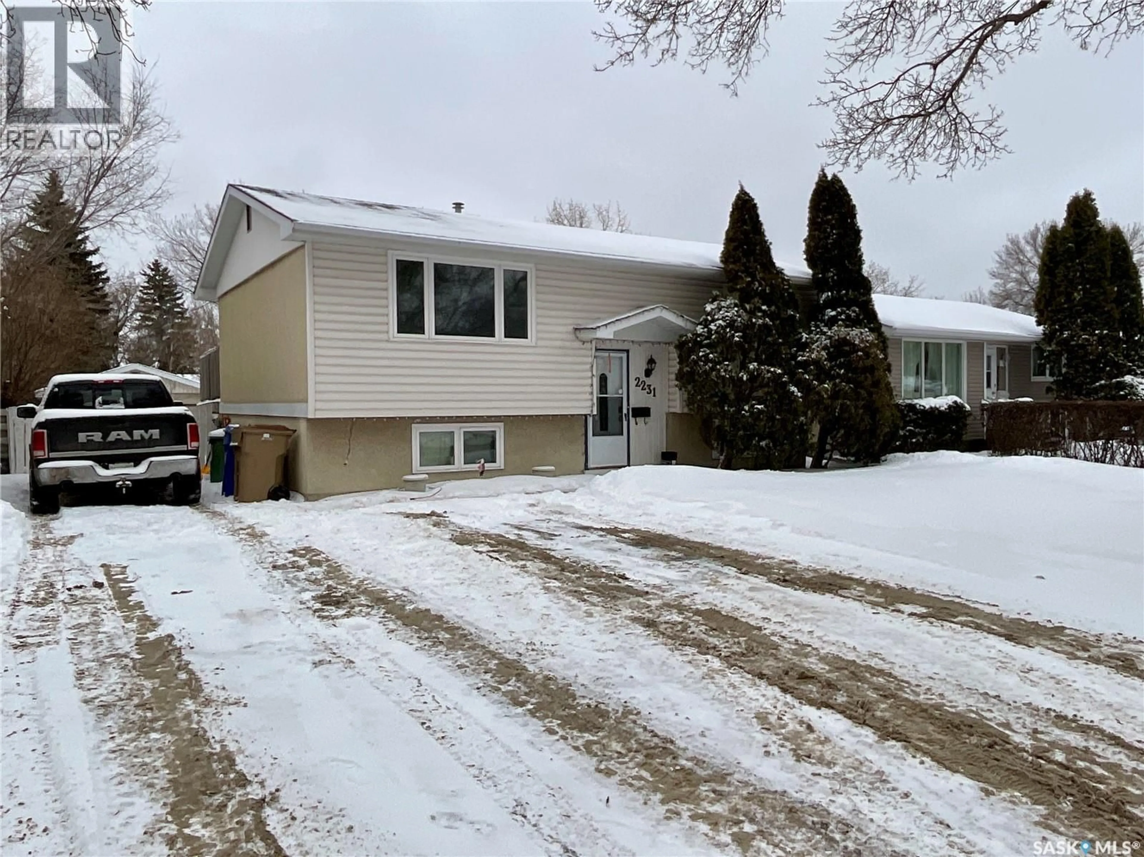 Home with vinyl exterior material, street for 2231 DEWDNEY AVENUE, Regina Saskatchewan S4N4C4