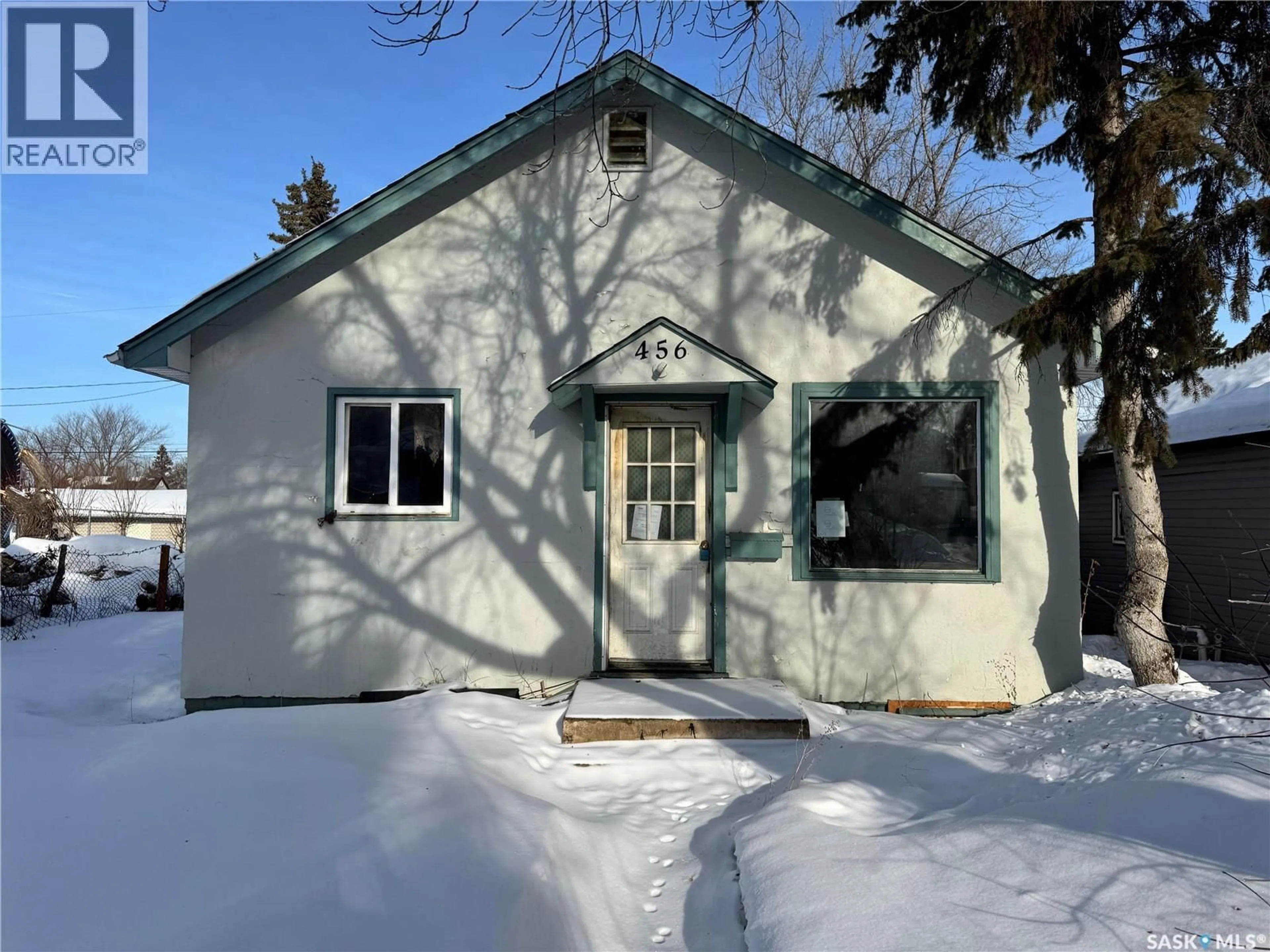 Home with vinyl exterior material, street for 456 21ST STREET, Prince Albert Saskatchewan S6V1M3