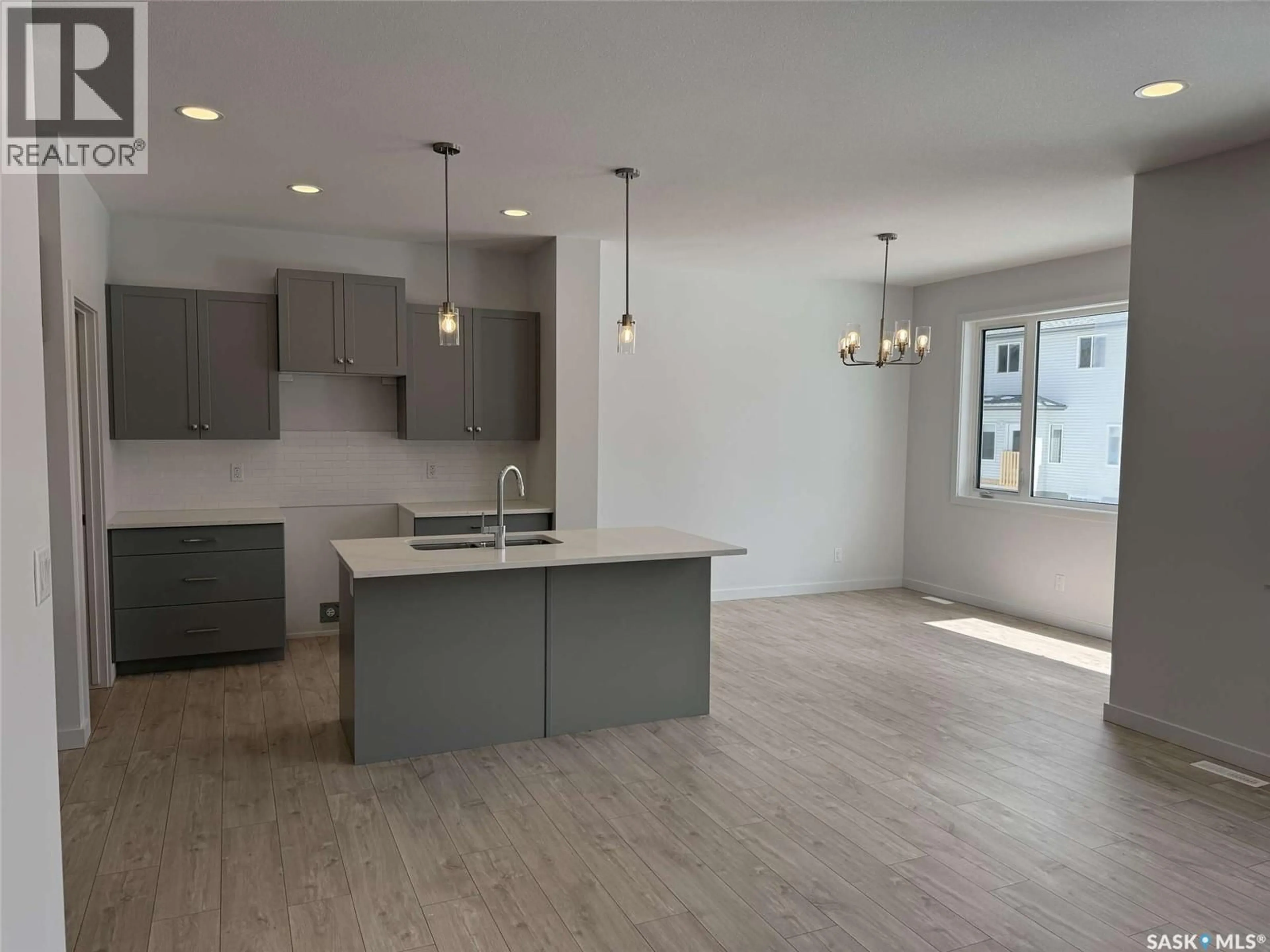 Open concept kitchen, unknown for 319 COWESSESS ROAD, Saskatoon Saskatchewan S7V1M3