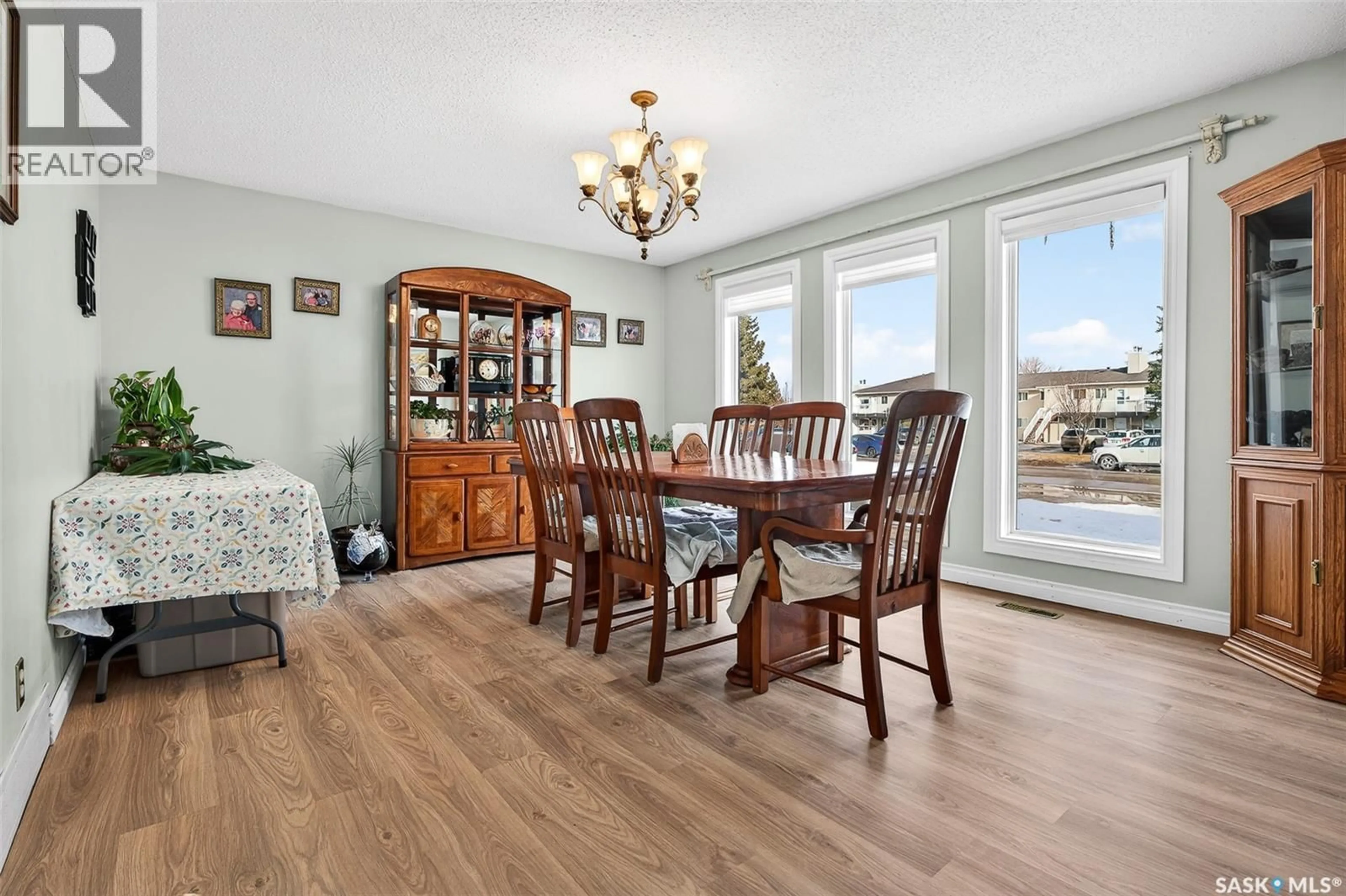 Dining room, wood/laminate floor for 70 WOOD LILY DRIVE, Moose Jaw Saskatchewan S6J1E2