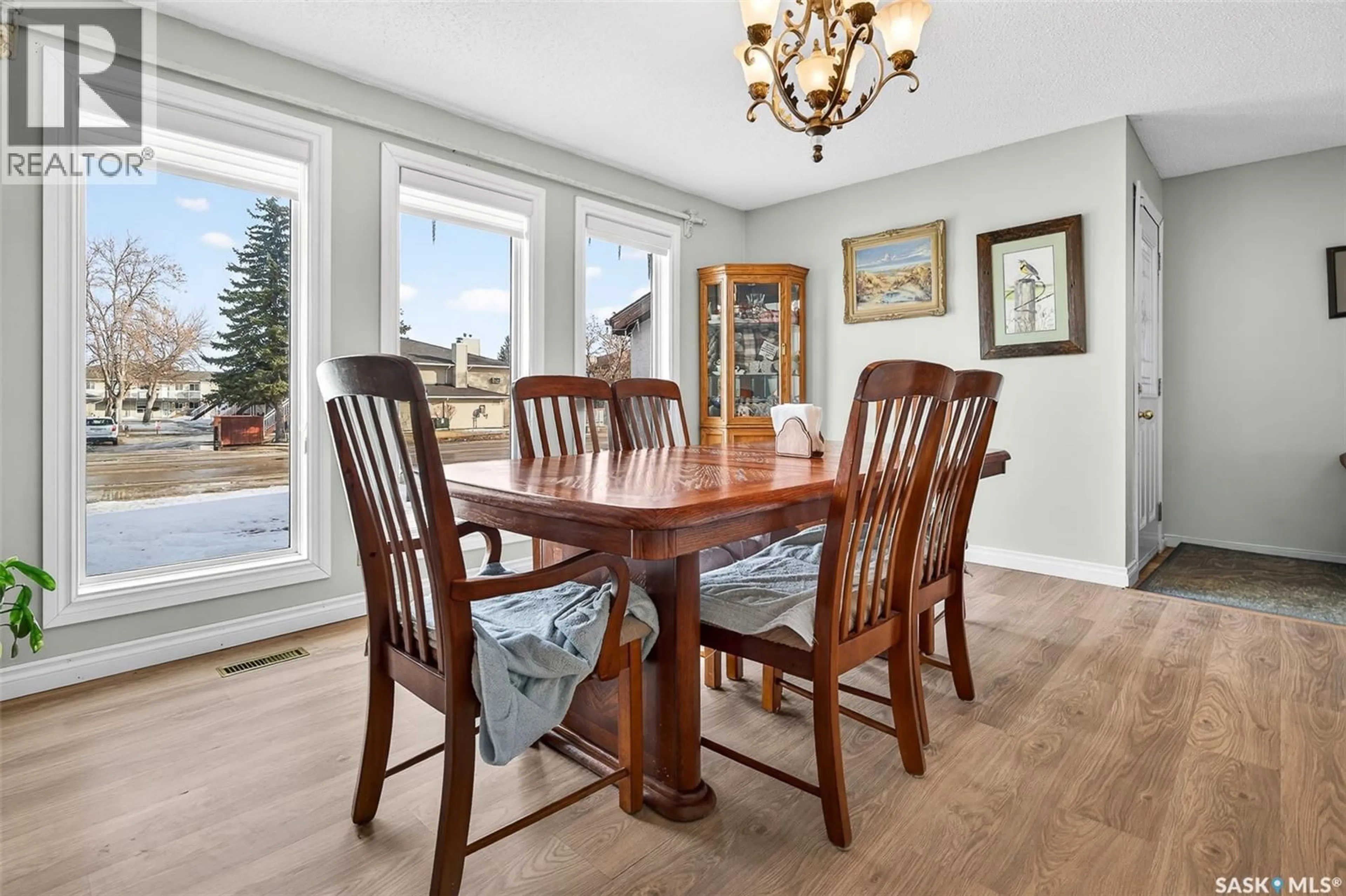 Dining room, wood/laminate floor for 70 WOOD LILY DRIVE, Moose Jaw Saskatchewan S6J1E2