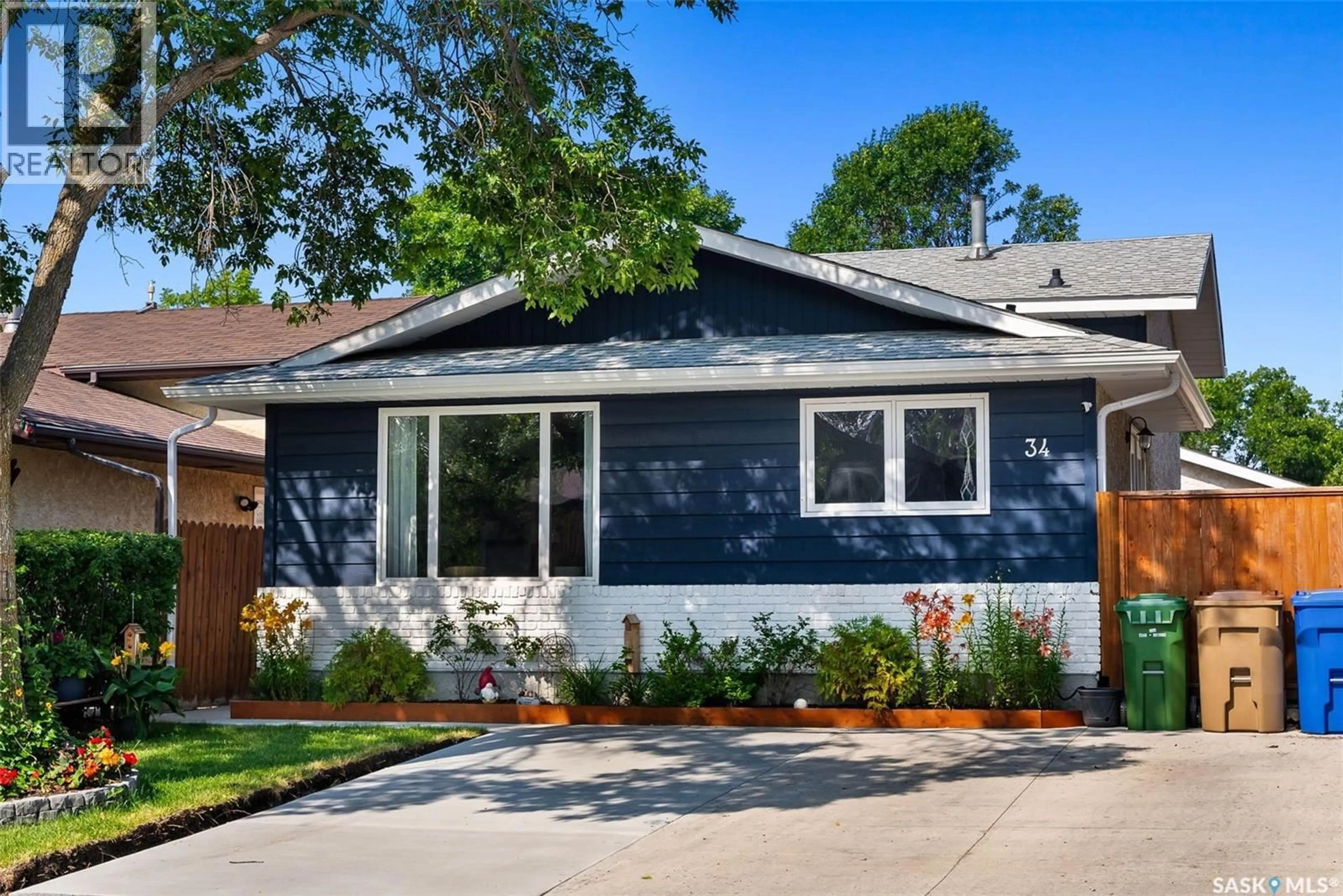 Home with brick exterior material, street for 34 CARTER CRESCENT, Regina Saskatchewan S4X2C7