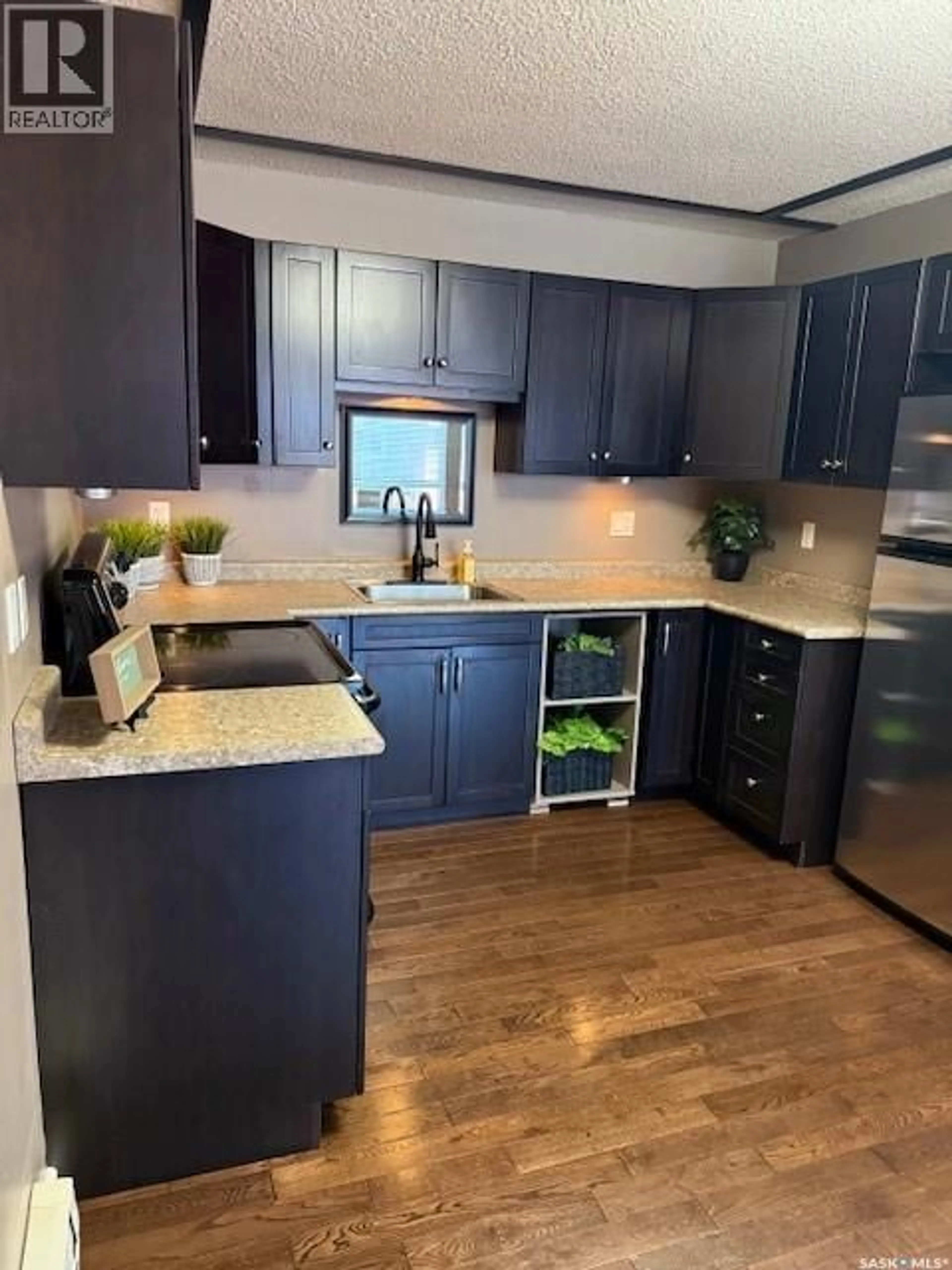 Open concept kitchen, unknown for 22 38 SPENCE STREET, Regina Saskatchewan S4S4H4