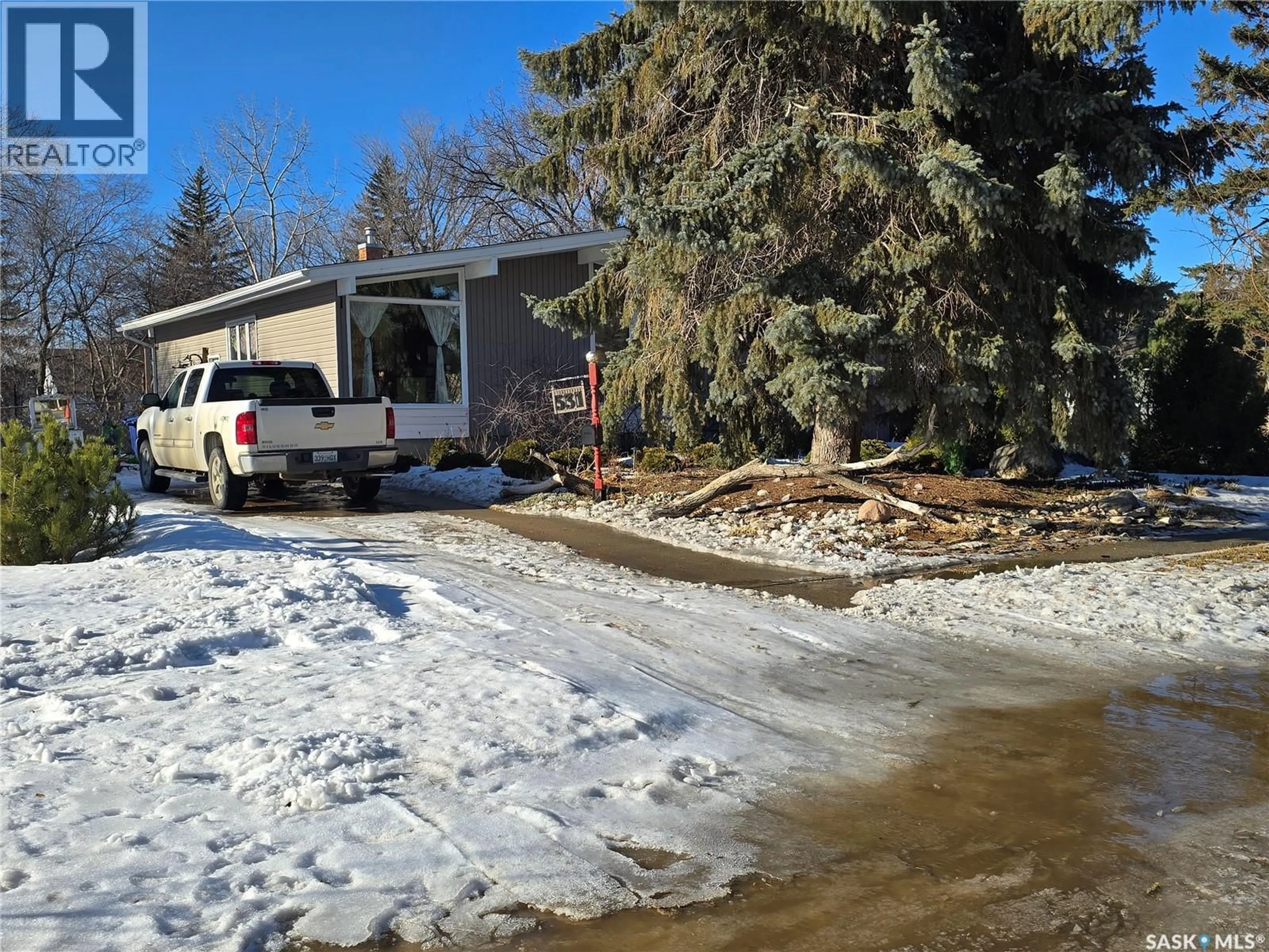 A pic from outside/outdoor area/front of a property/back of a property/a pic from drone, water/lake/river/ocean view for 531 SCOTT STREET, Weyburn Saskatchewan S4H1T2