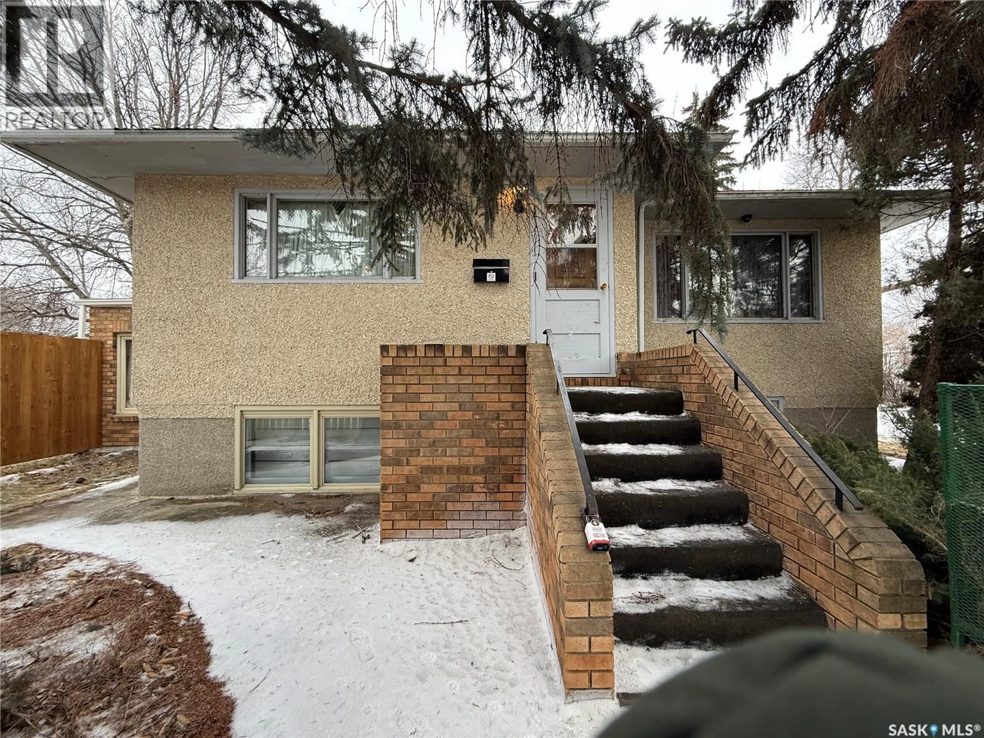 Home with brick exterior material, street for 637 TAPLEY STREET, Moose Jaw Saskatchewan S6H5T8
