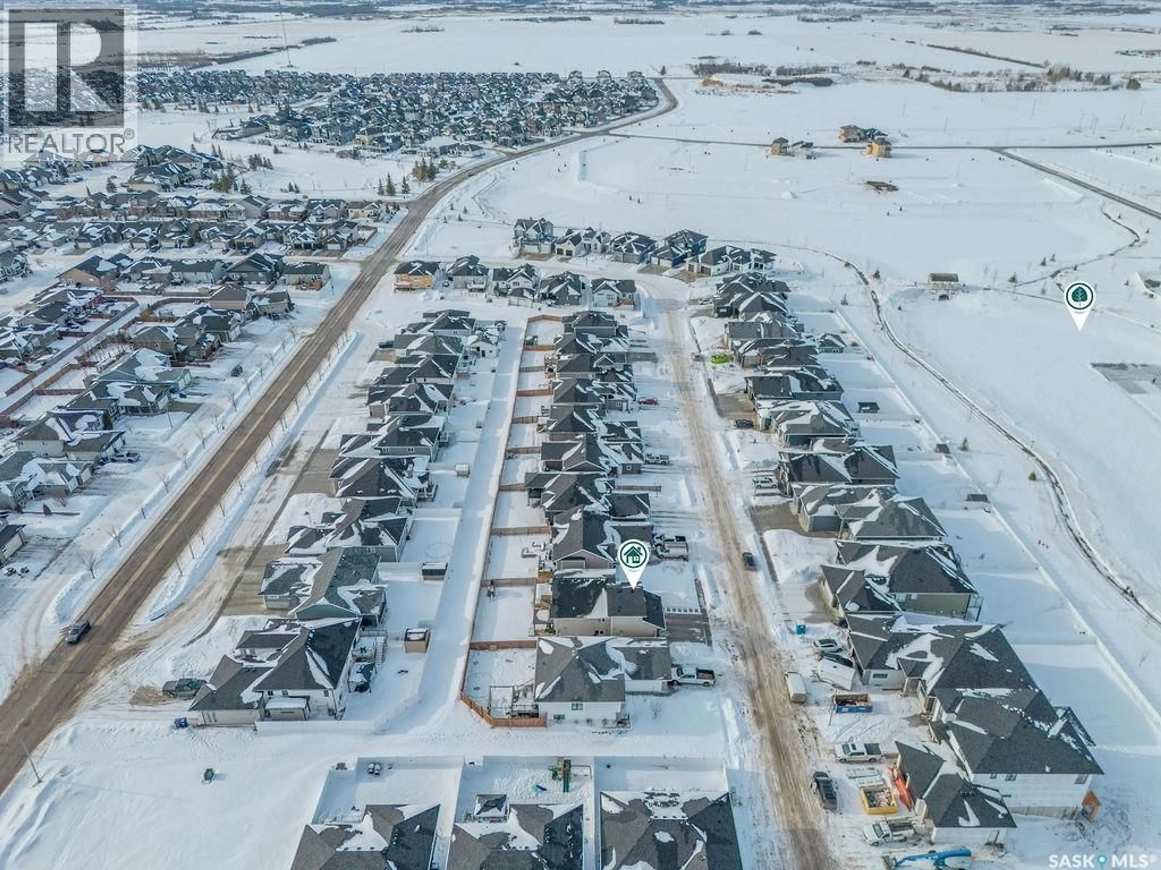 A pic from outside/outdoor area/front of a property/back of a property/a pic from drone, street for 203 SETTLER CRESCENT, Warman Saskatchewan S0K4S5