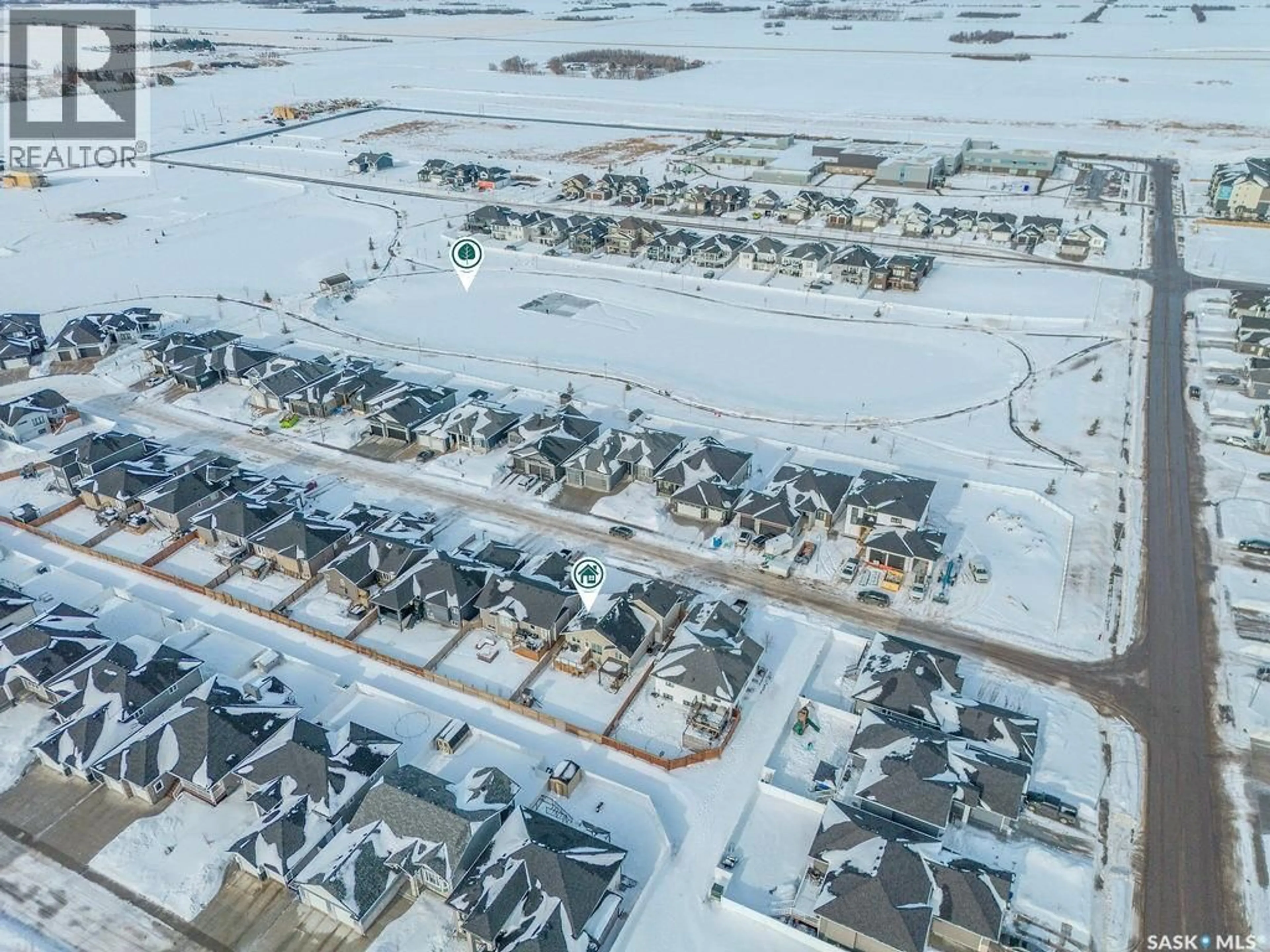 A pic from outside/outdoor area/front of a property/back of a property/a pic from drone, street for 203 SETTLER CRESCENT, Warman Saskatchewan S0K4S5