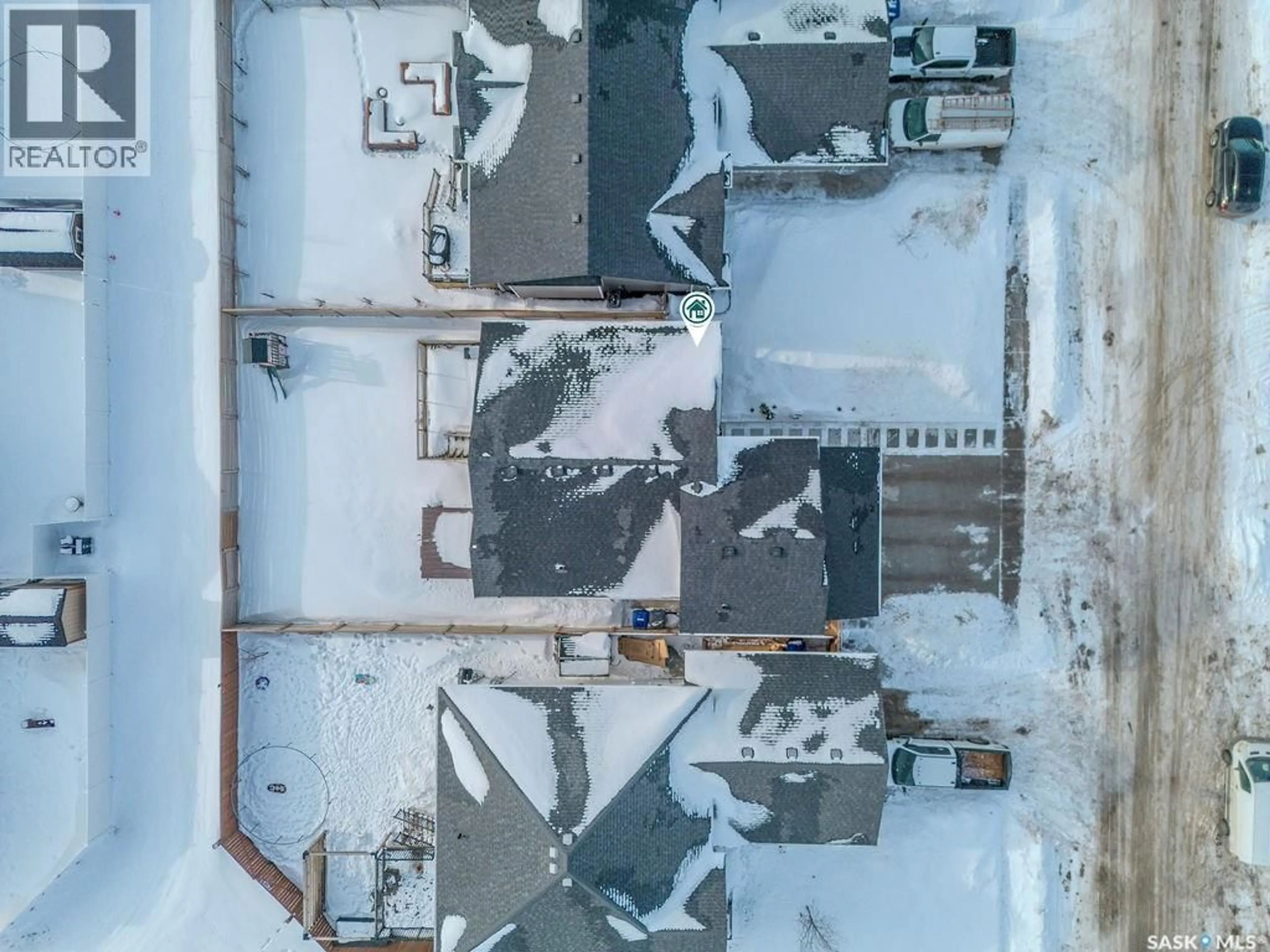 A pic from outside/outdoor area/front of a property/back of a property/a pic from drone, building for 203 SETTLER CRESCENT, Warman Saskatchewan S0K4S5