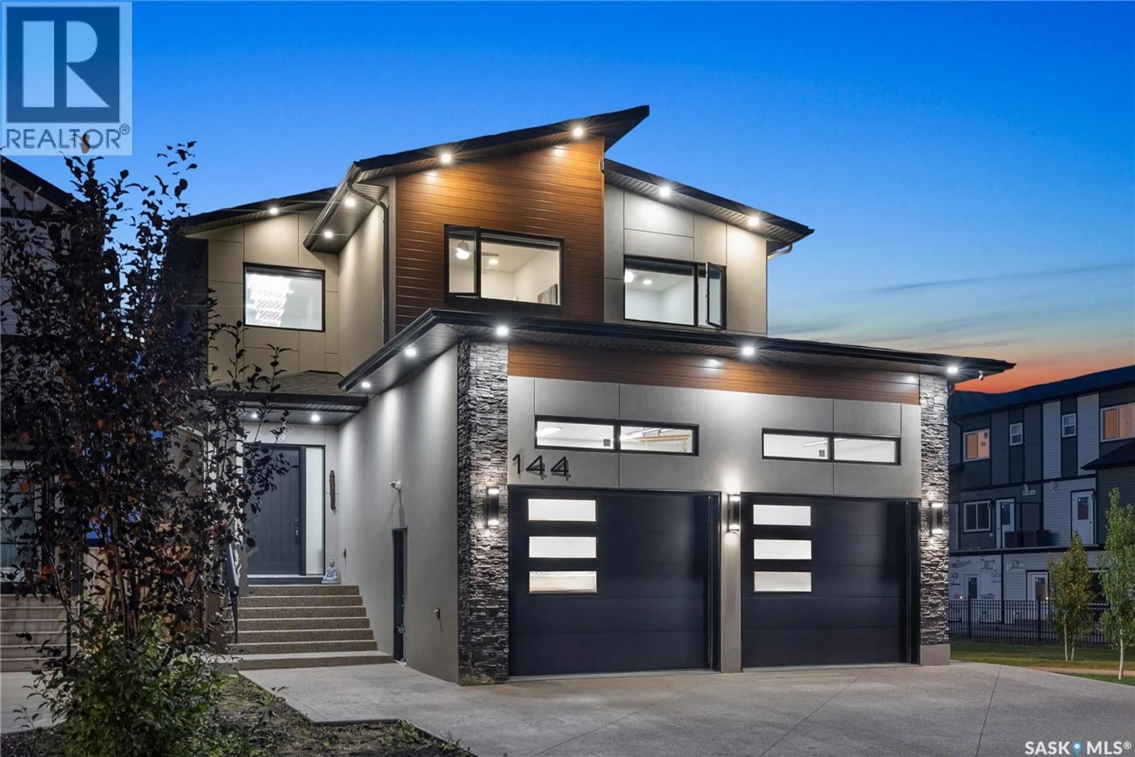 Home with brick exterior material, street for 144 FORSEY AVENUE, Saskatoon Saskatchewan S7W0Z6