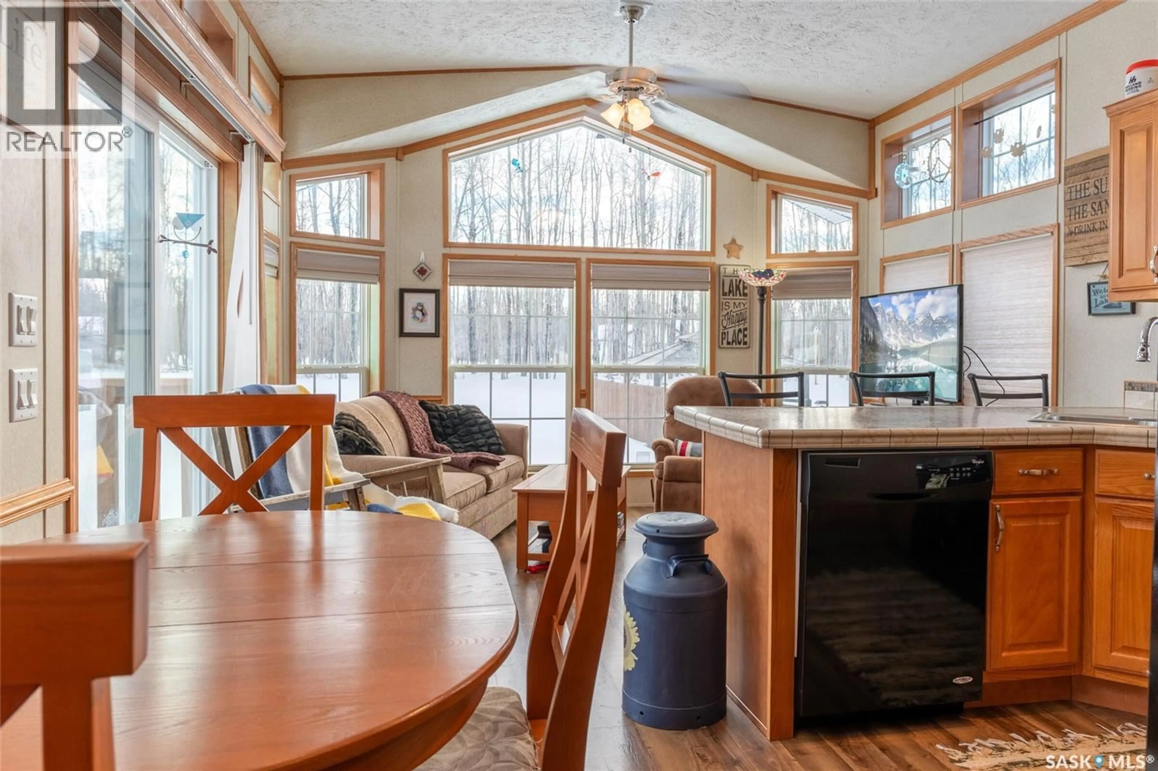 Open concept kitchen, wood/laminate floor for 1209 OAK AVENUE, Lac des Îles Saskatchewan S0M1A0