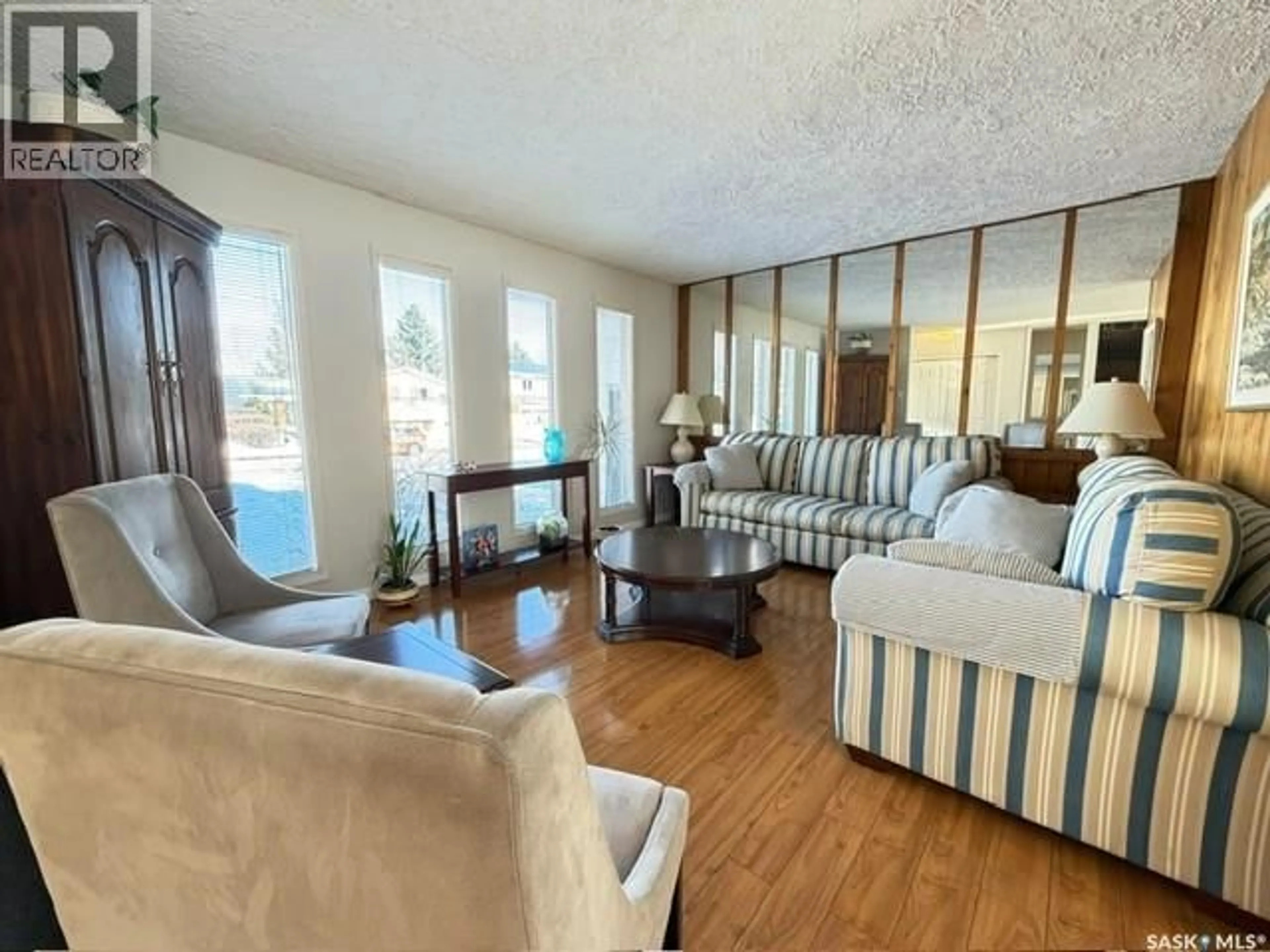 Living room with furniture, unknown for 10 DRAGAN CRESCENT, Saskatoon Saskatchewan S7H5C9