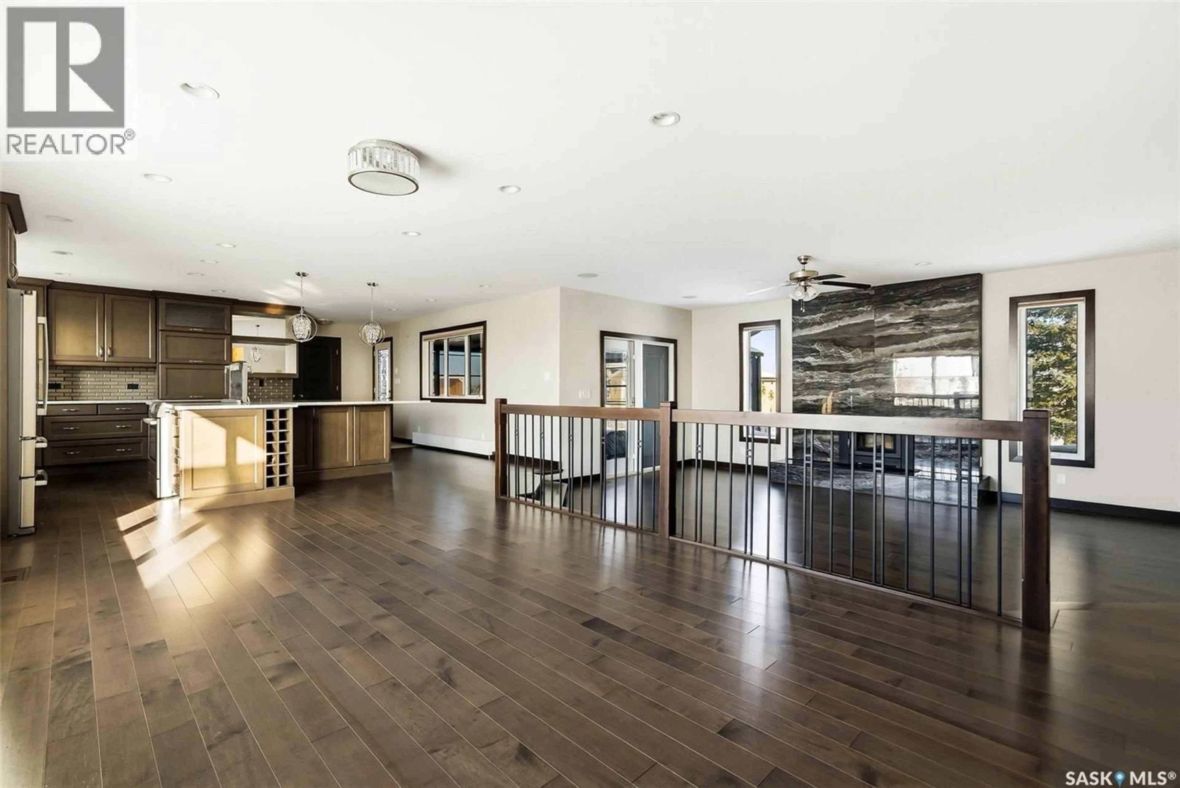 Open concept kitchen, wood/laminate floor for MATT ACREAGE, Edenwold Saskatchewan S0G4G0