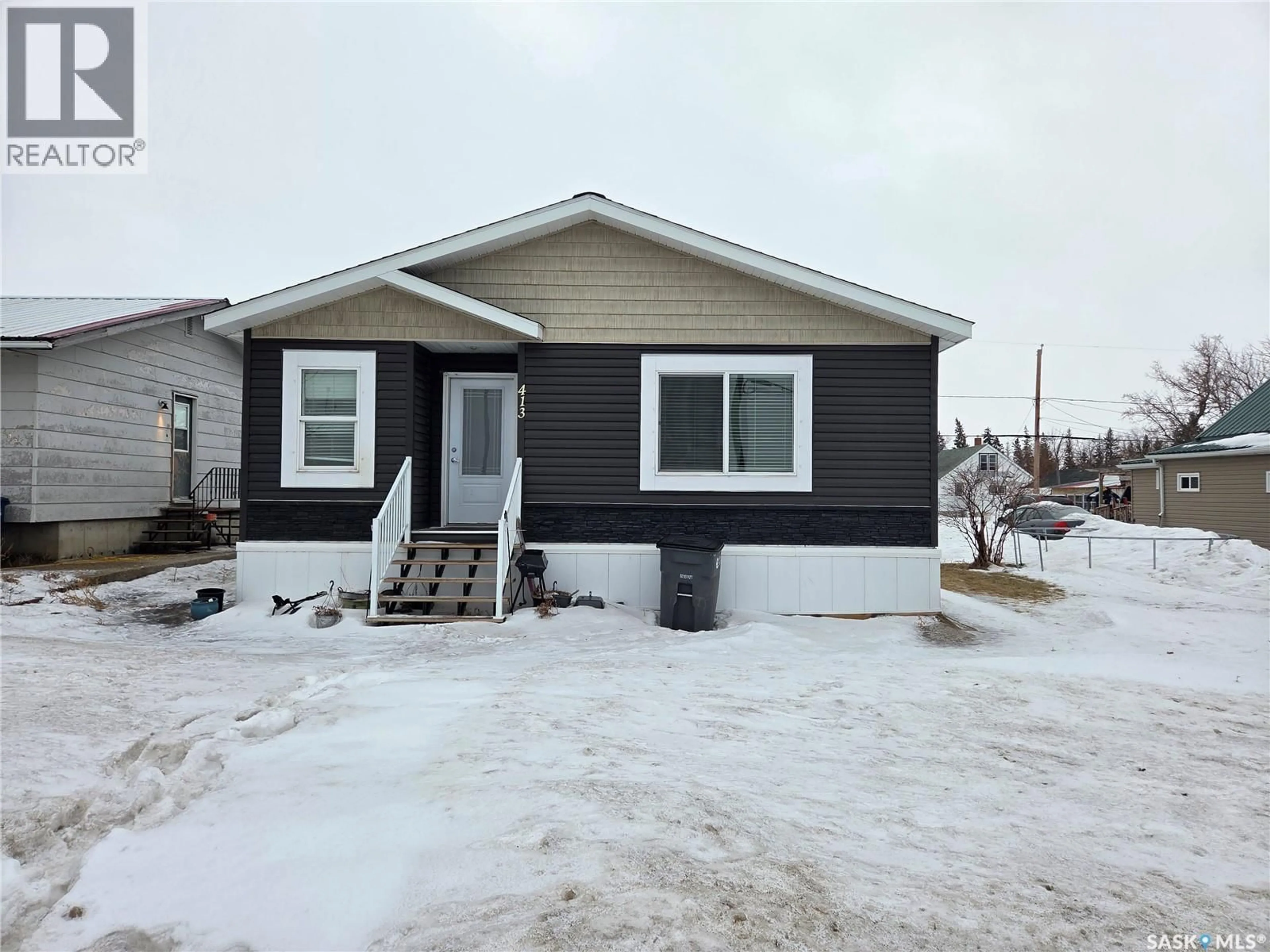 Home with vinyl exterior material, street for 413 RAILWAY STREET, Kipling Saskatchewan S0G2S0