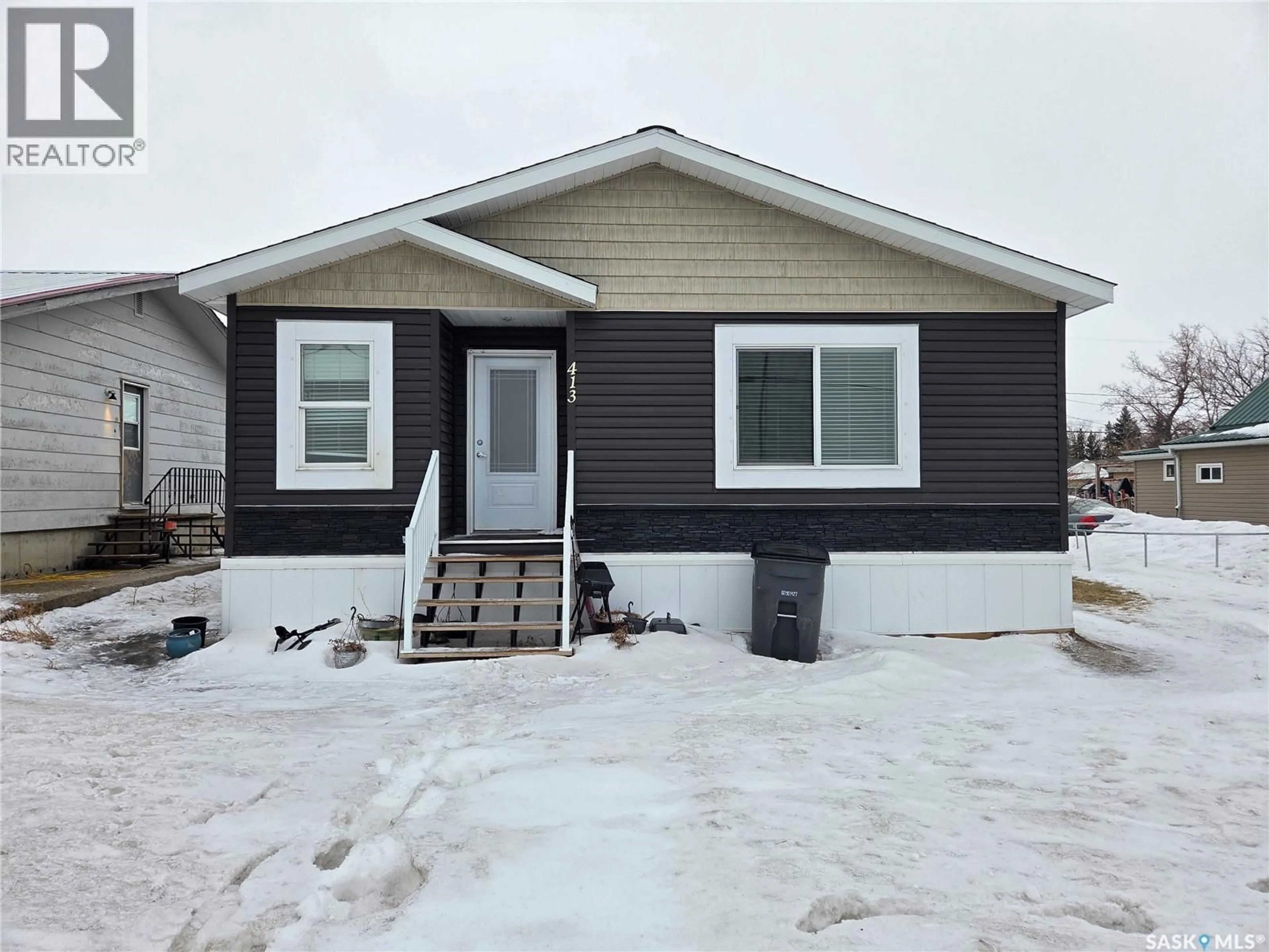 Home with vinyl exterior material, street for 413 RAILWAY STREET, Kipling Saskatchewan S0G2S0