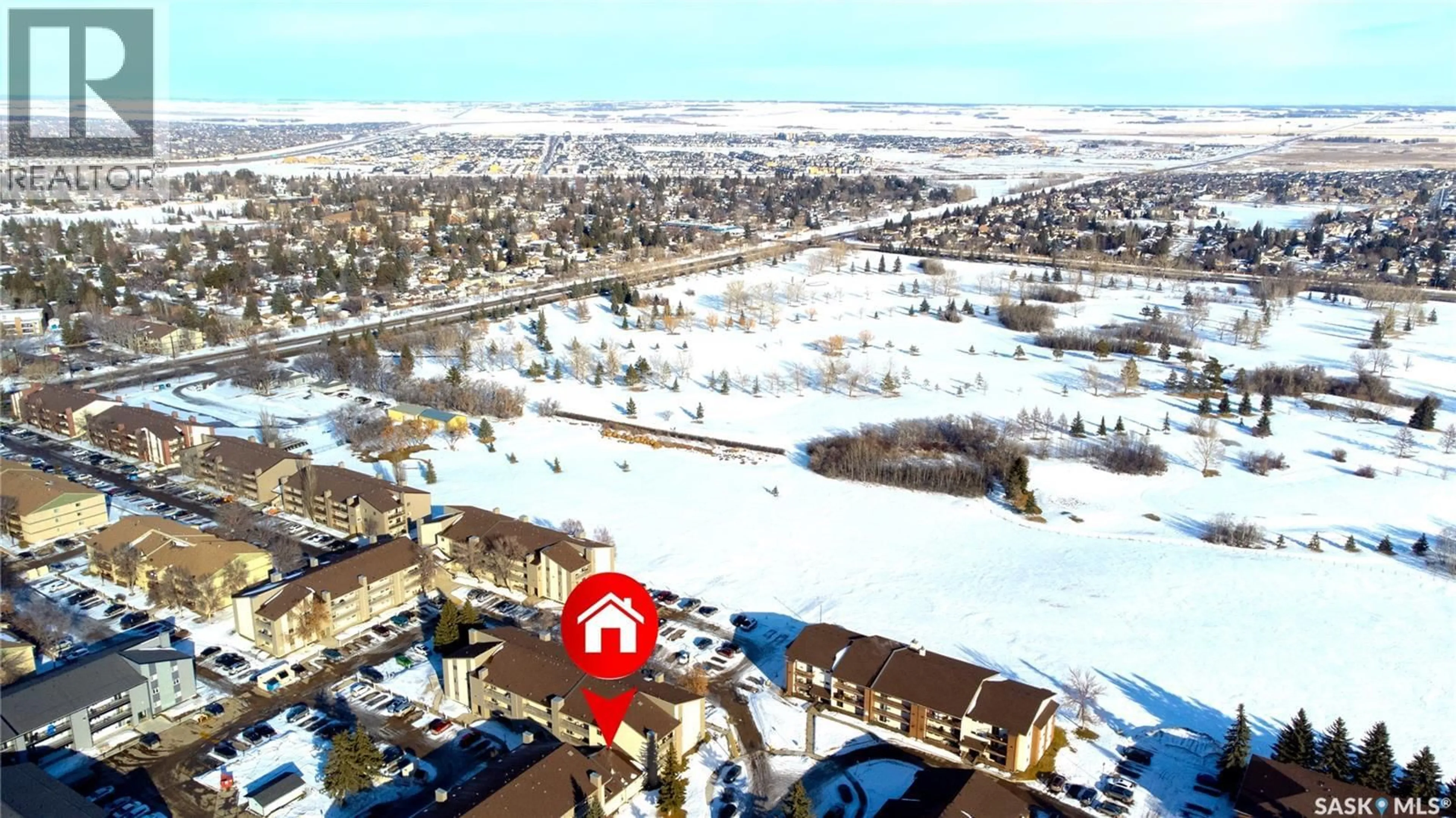 A pic from outside/outdoor area/front of a property/back of a property/a pic from drone, water/lake/river/ocean view for 112 203 TAIT PLACE, Saskatoon Saskatchewan S7H5L7