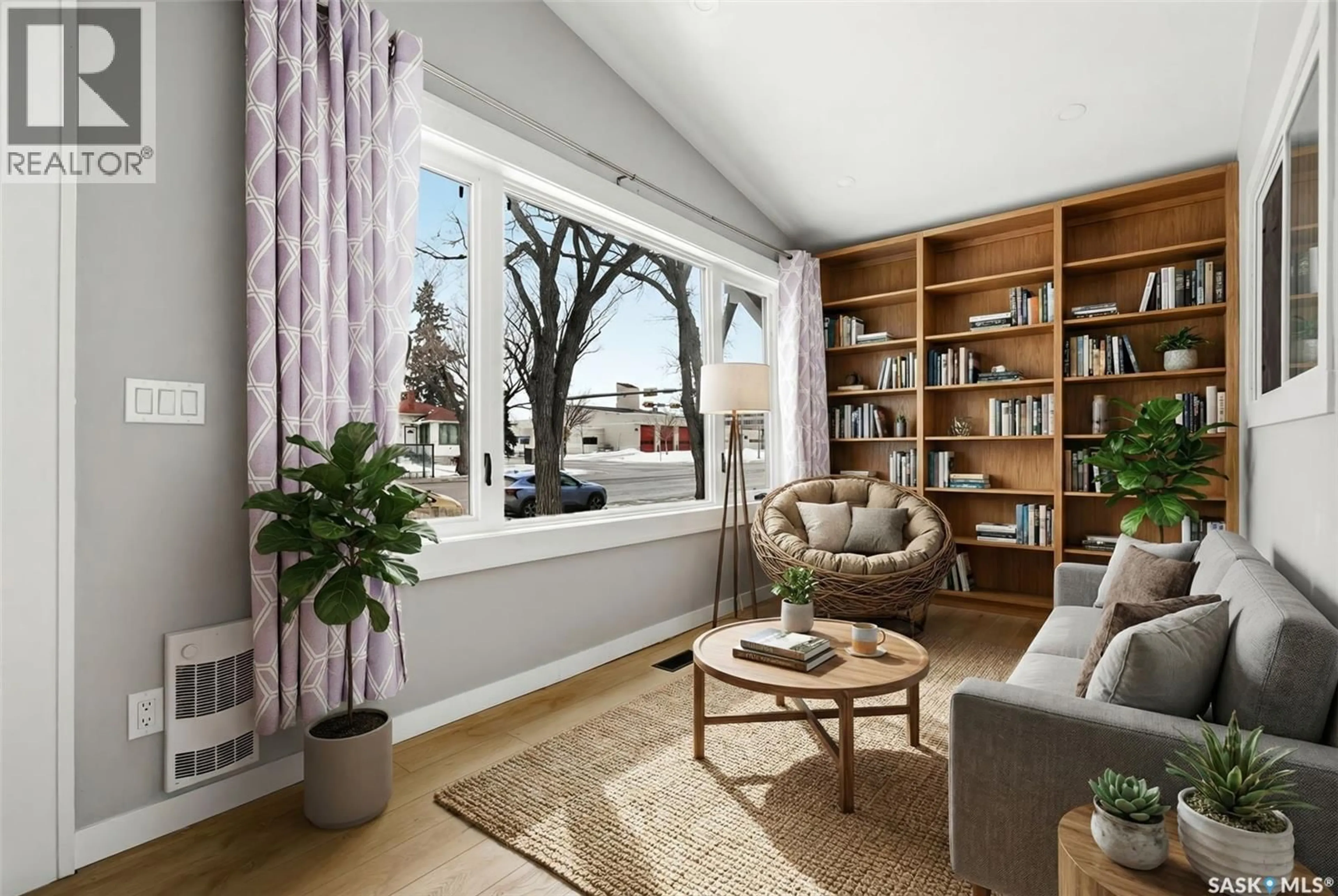 Living room with furniture, wood/laminate floor for 3726 DEWDNEY AVENUE, Regina Saskatchewan S4T0Z7