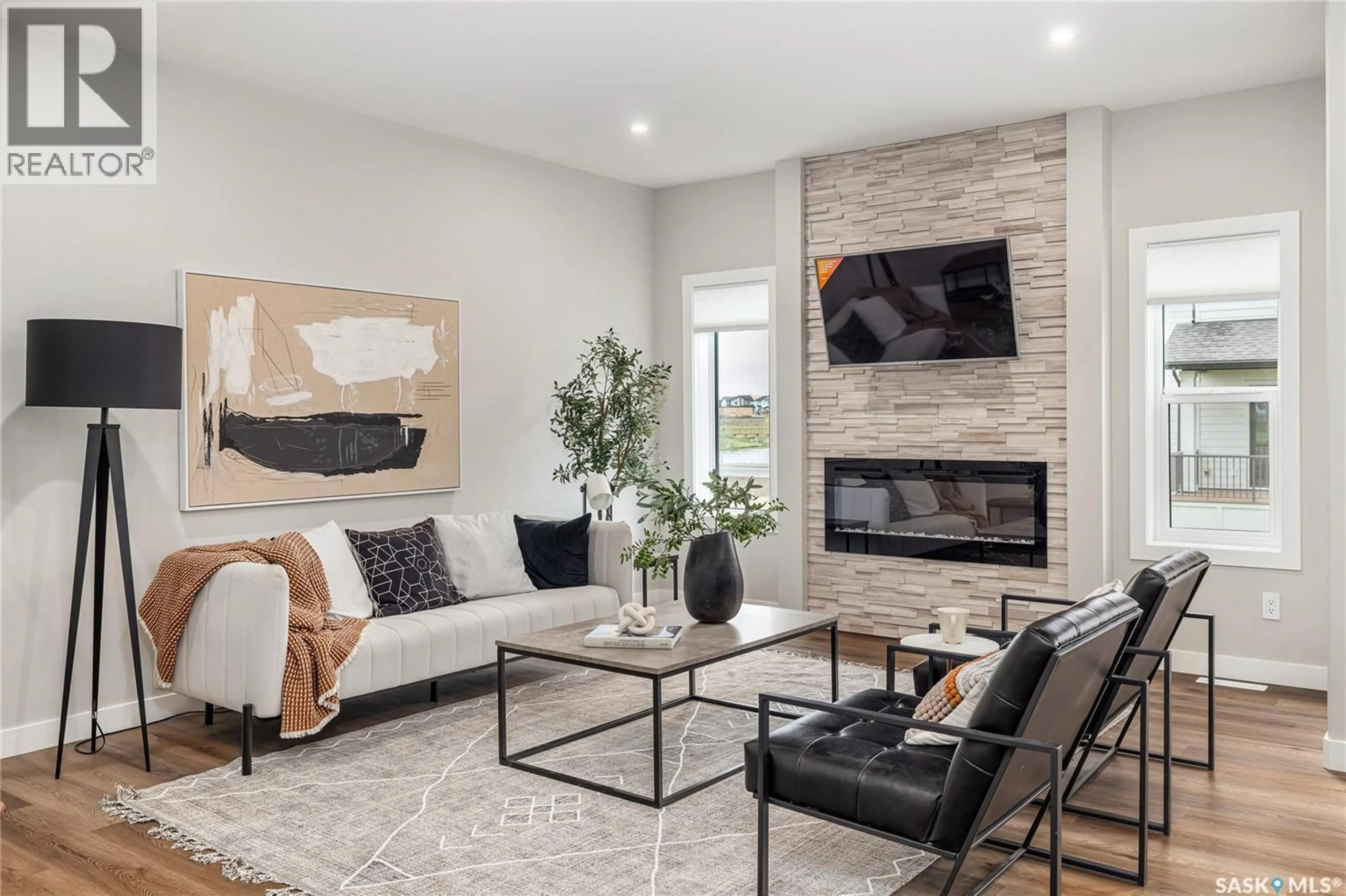 Living room with furniture, unknown for 323 ASOKAN BEND, Saskatoon Saskatchewan S7V1V7