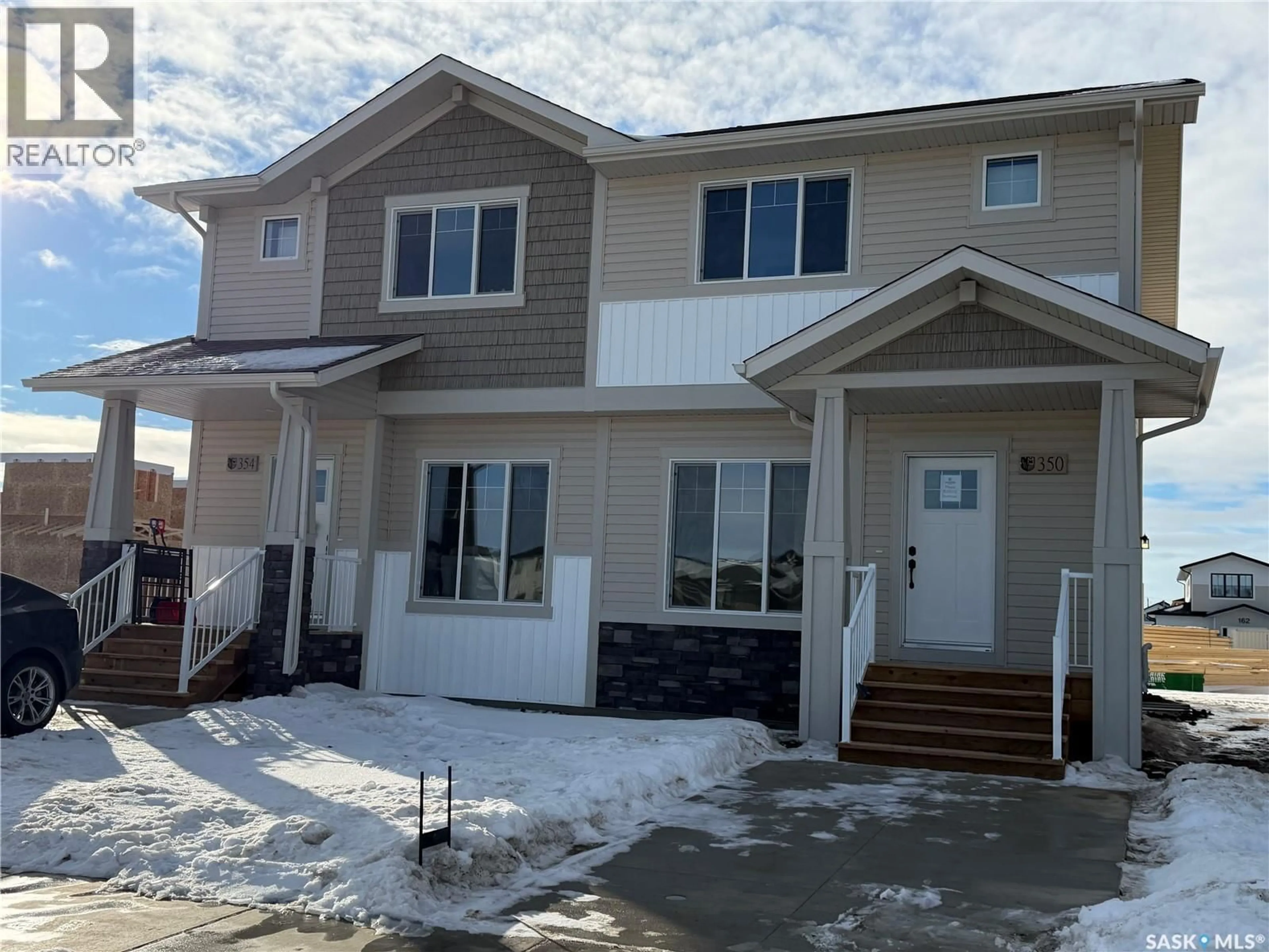 Home with vinyl exterior material, street for 350 COWESSESS ROAD, Saskatoon Saskatchewan S7V1Y4