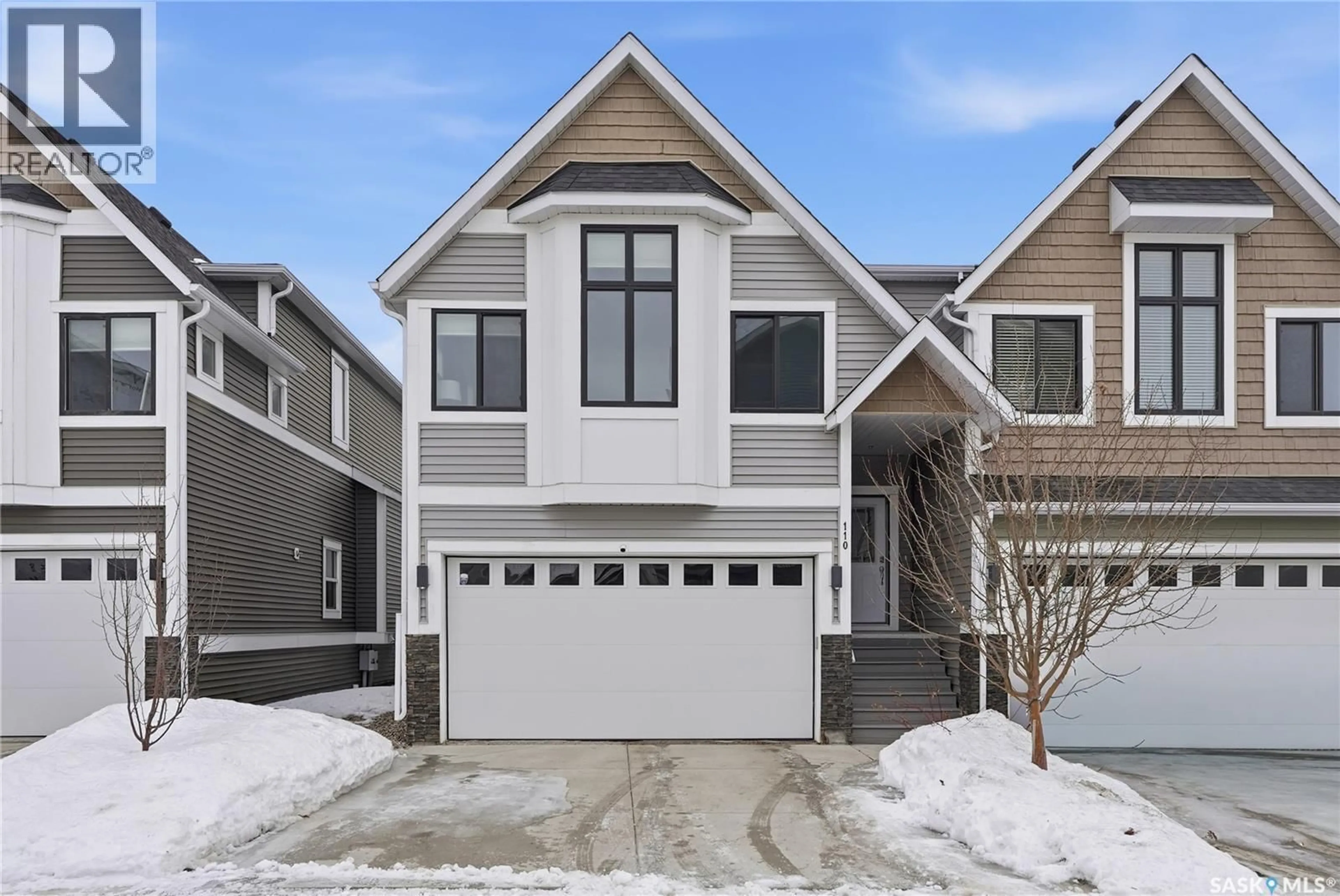 Home with vinyl exterior material, street for 110 3220 11TH STREET W, Saskatoon Saskatchewan S7M5M4