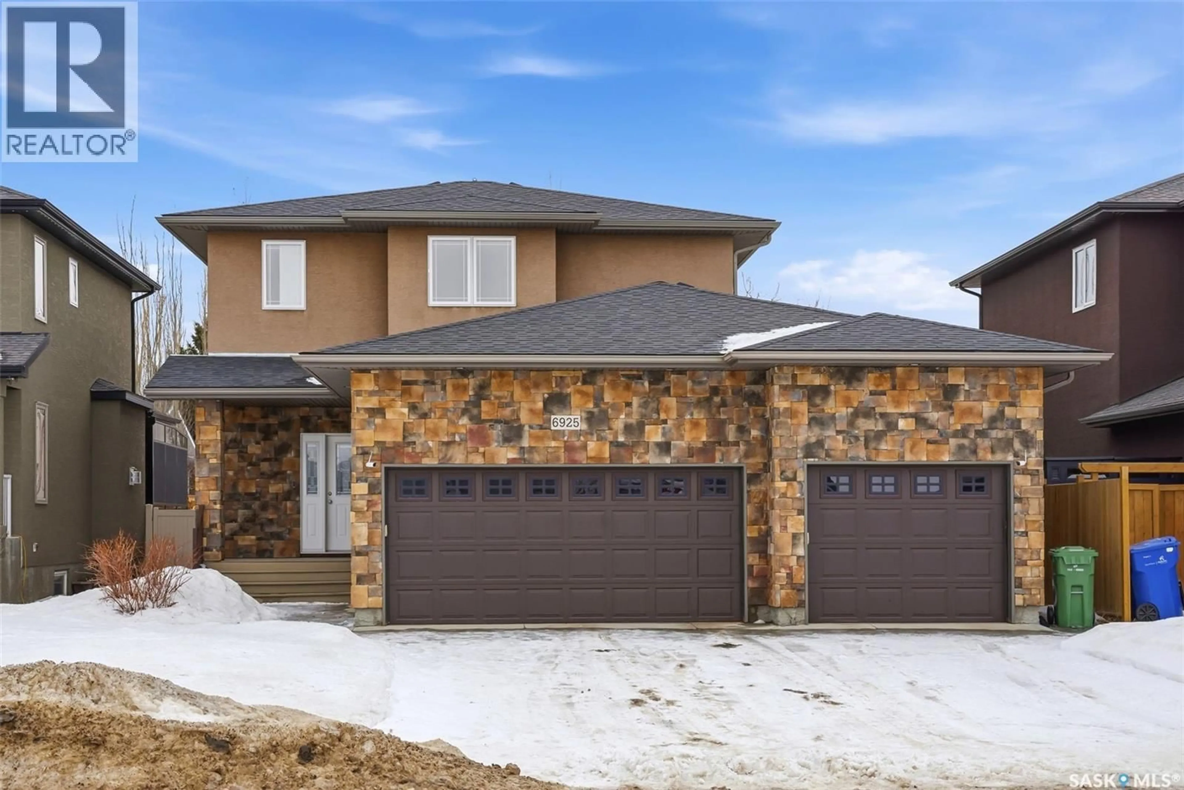 Home with brick exterior material, street for 6925 MAPLE RIDGE DRIVE, Regina Saskatchewan S4X4J2