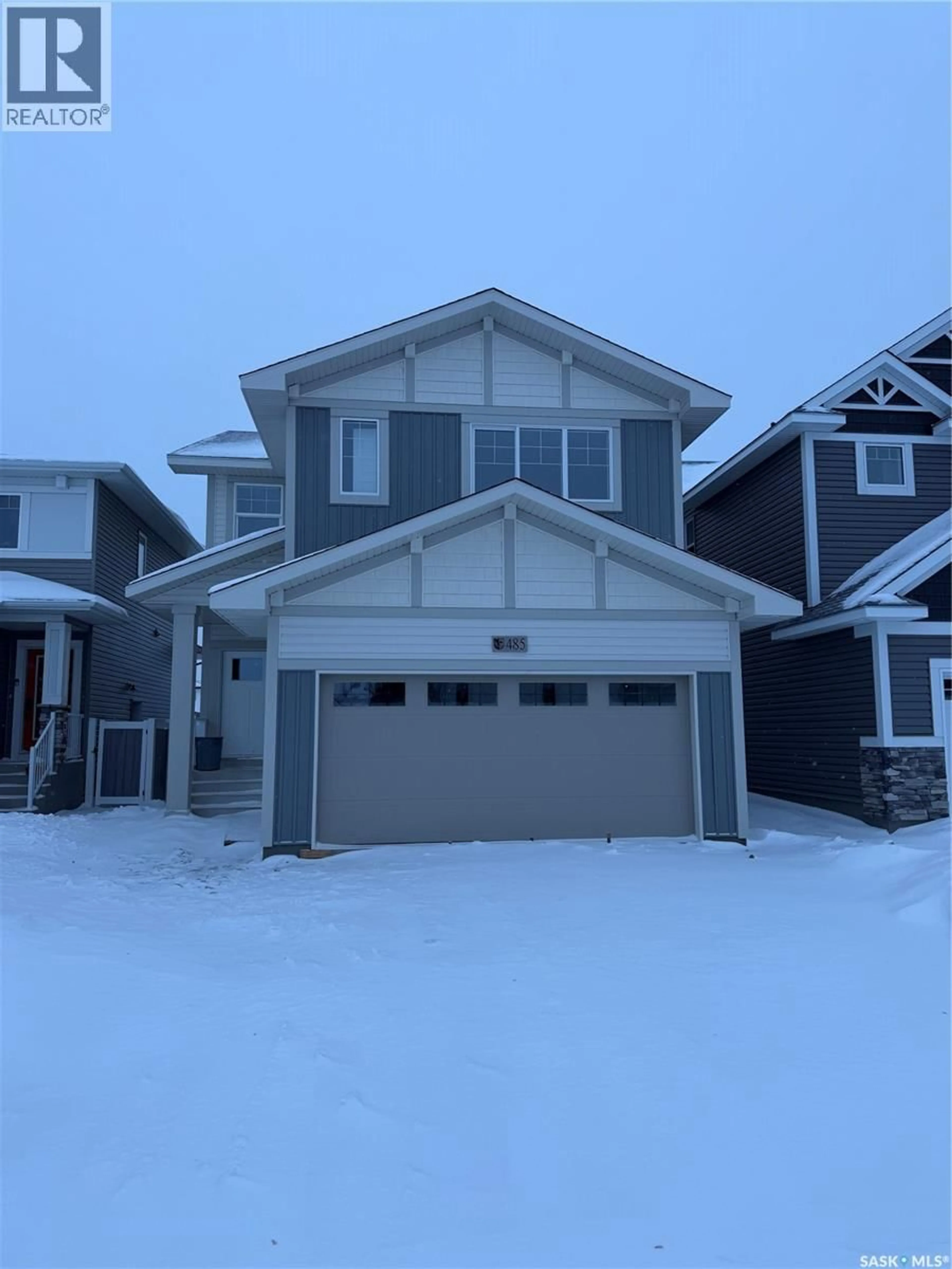 Home with vinyl exterior material, street for 485 GERMAIN MANOR, Saskatoon Saskatchewan S7W0Y3