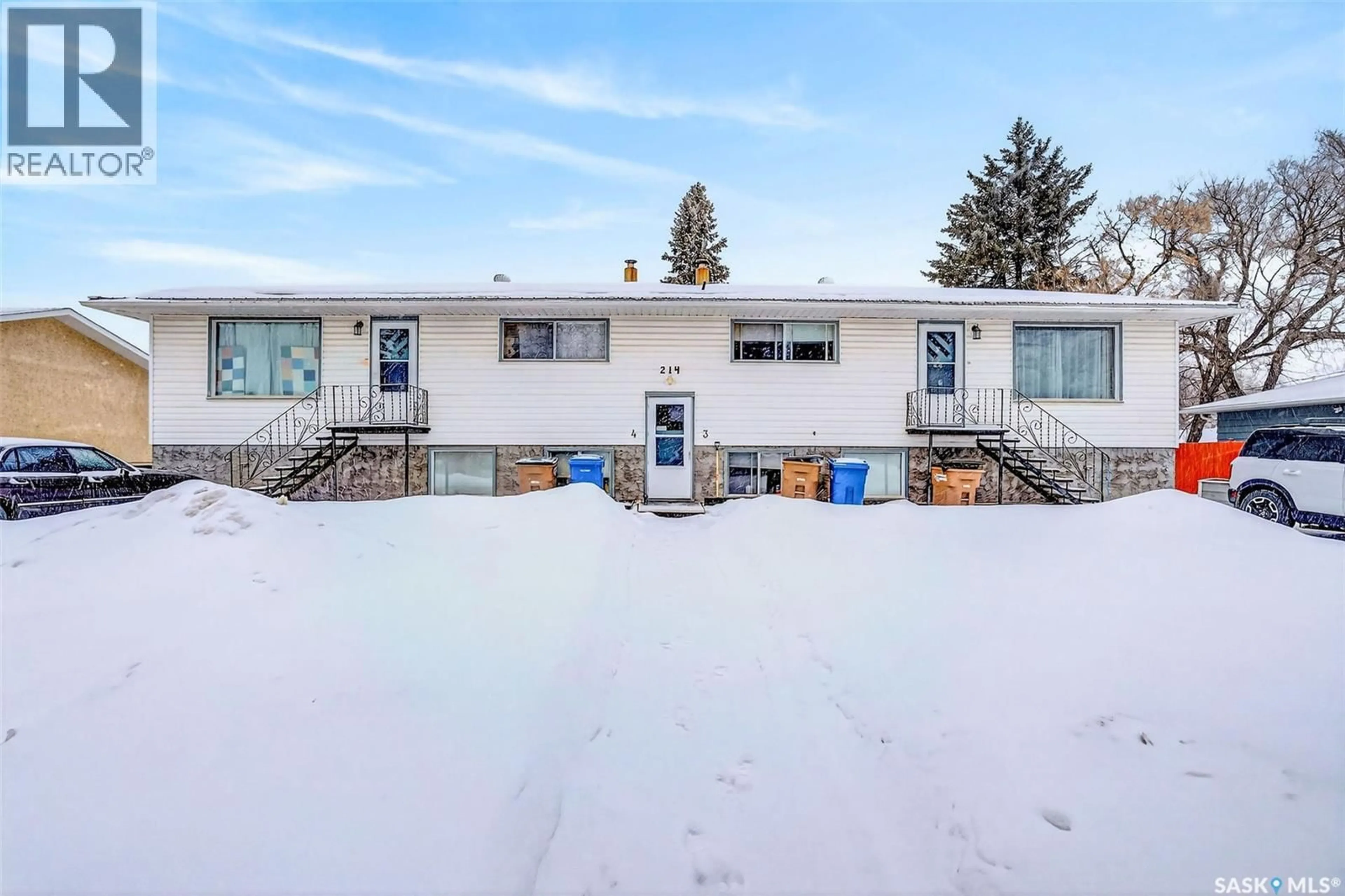 A pic from outside/outdoor area/front of a property/back of a property/a pic from drone, unknown for 214 HIGGINS AVENUE, Melfort Saskatchewan S0E1A0