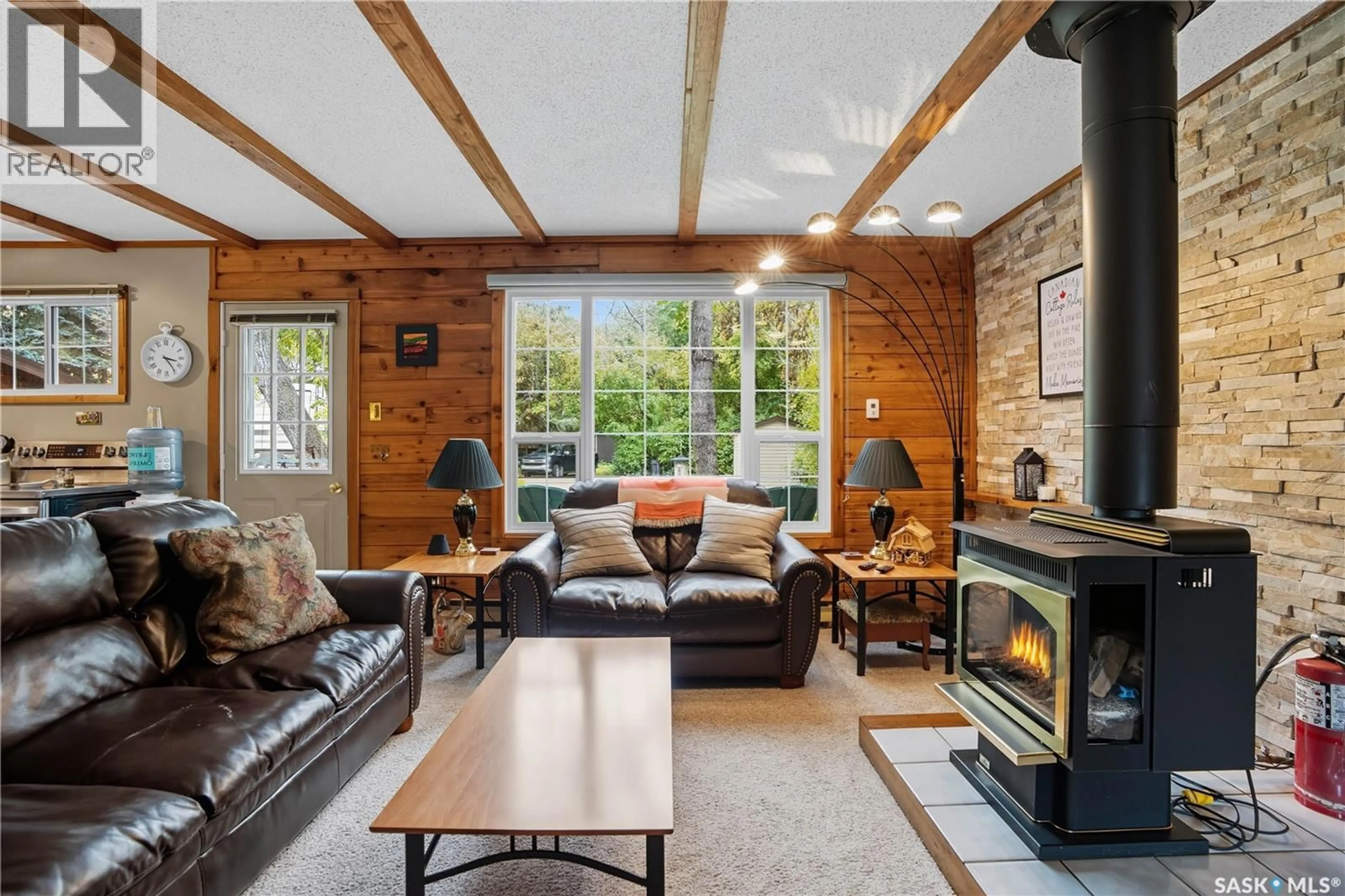 Living room with furniture, wood/laminate floor for 267 SMITH STREET, Katepwa Beach Saskatchewan S0G2Y0