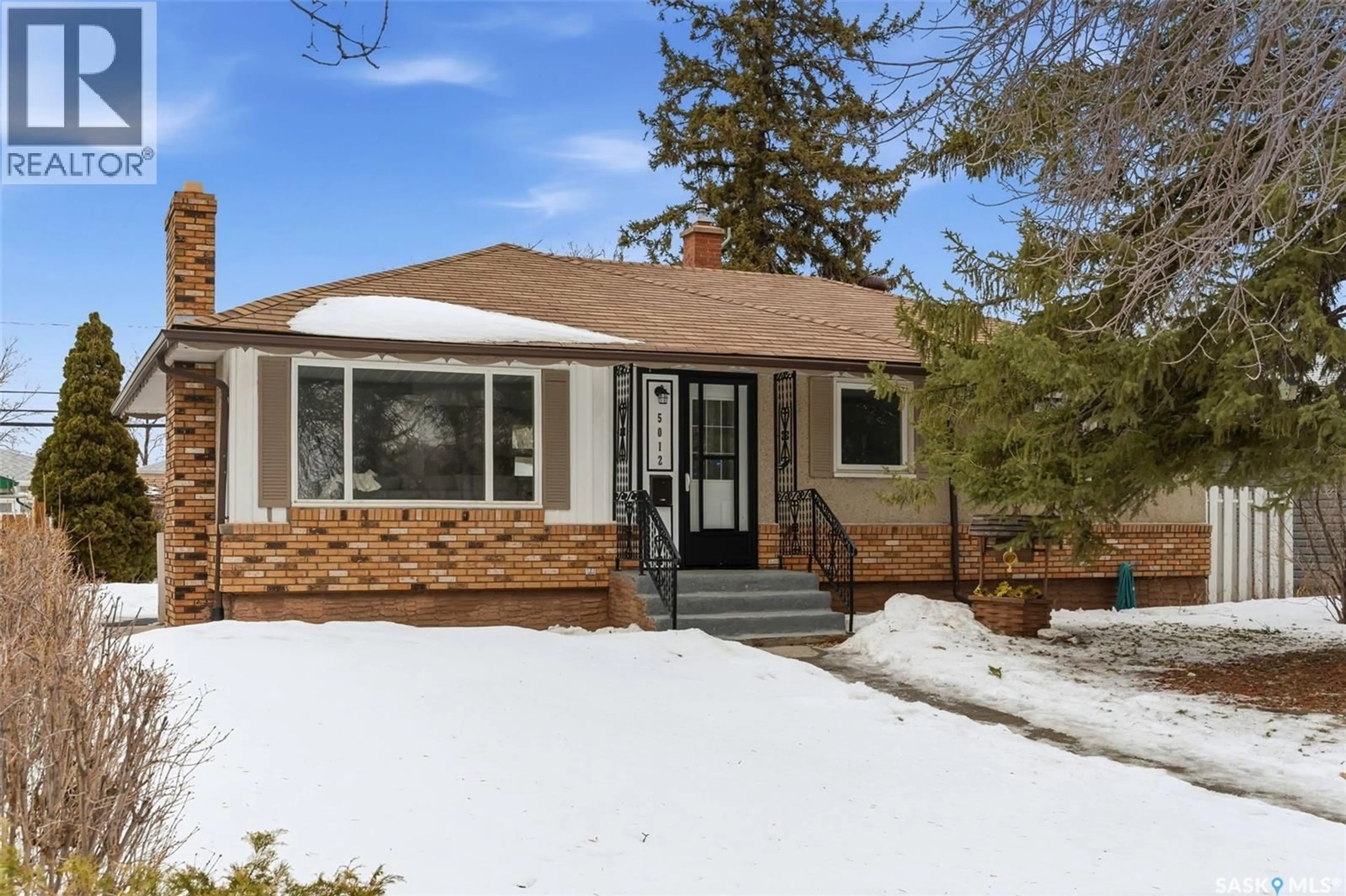 Home with brick exterior material, street for 5012 1ST AVENUE, Regina Saskatchewan S4T0A5