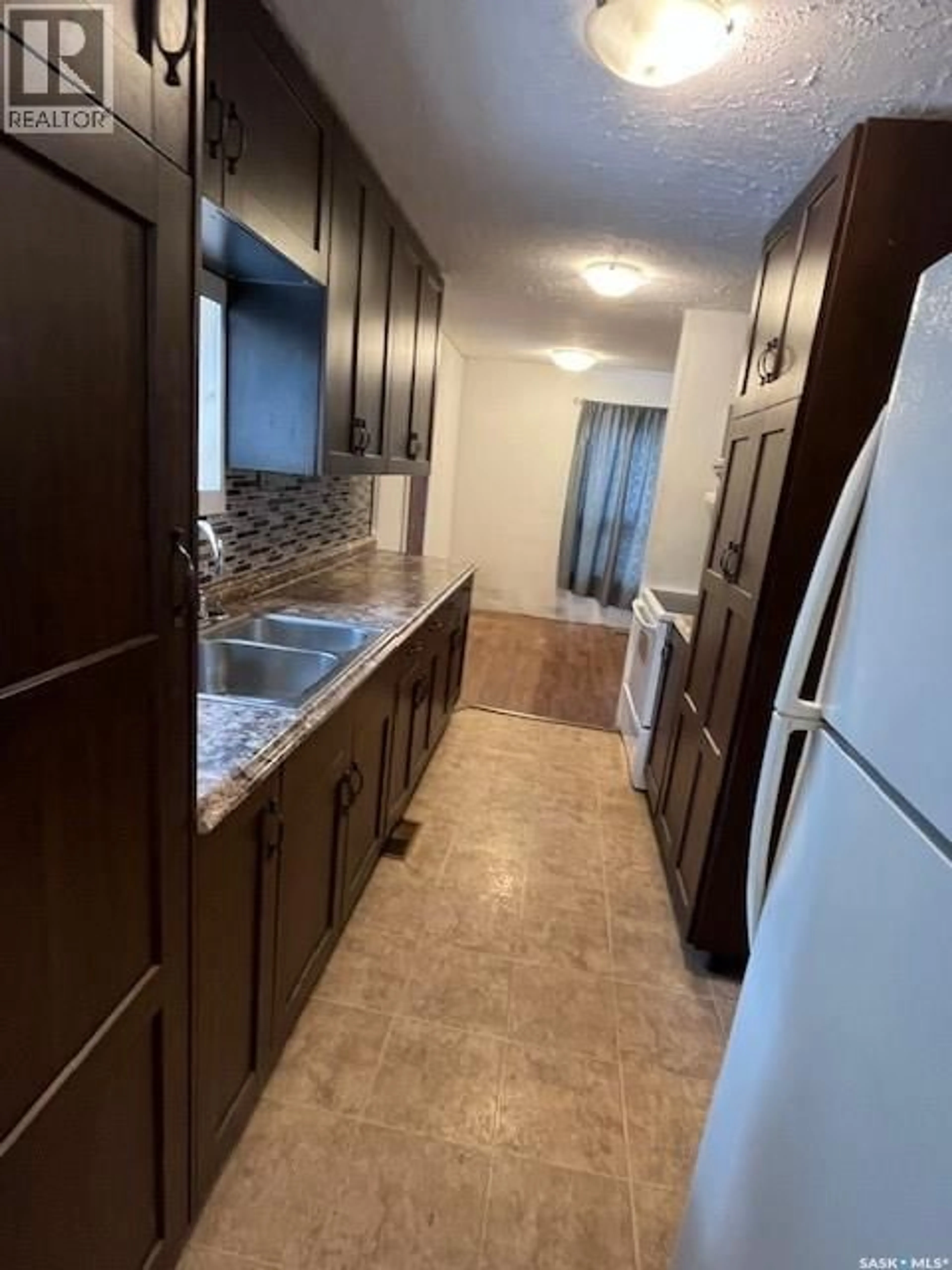 Standard kitchen, ceramic/tile floor for 112 MAIN STREET, Harris Saskatchewan S0L1K0