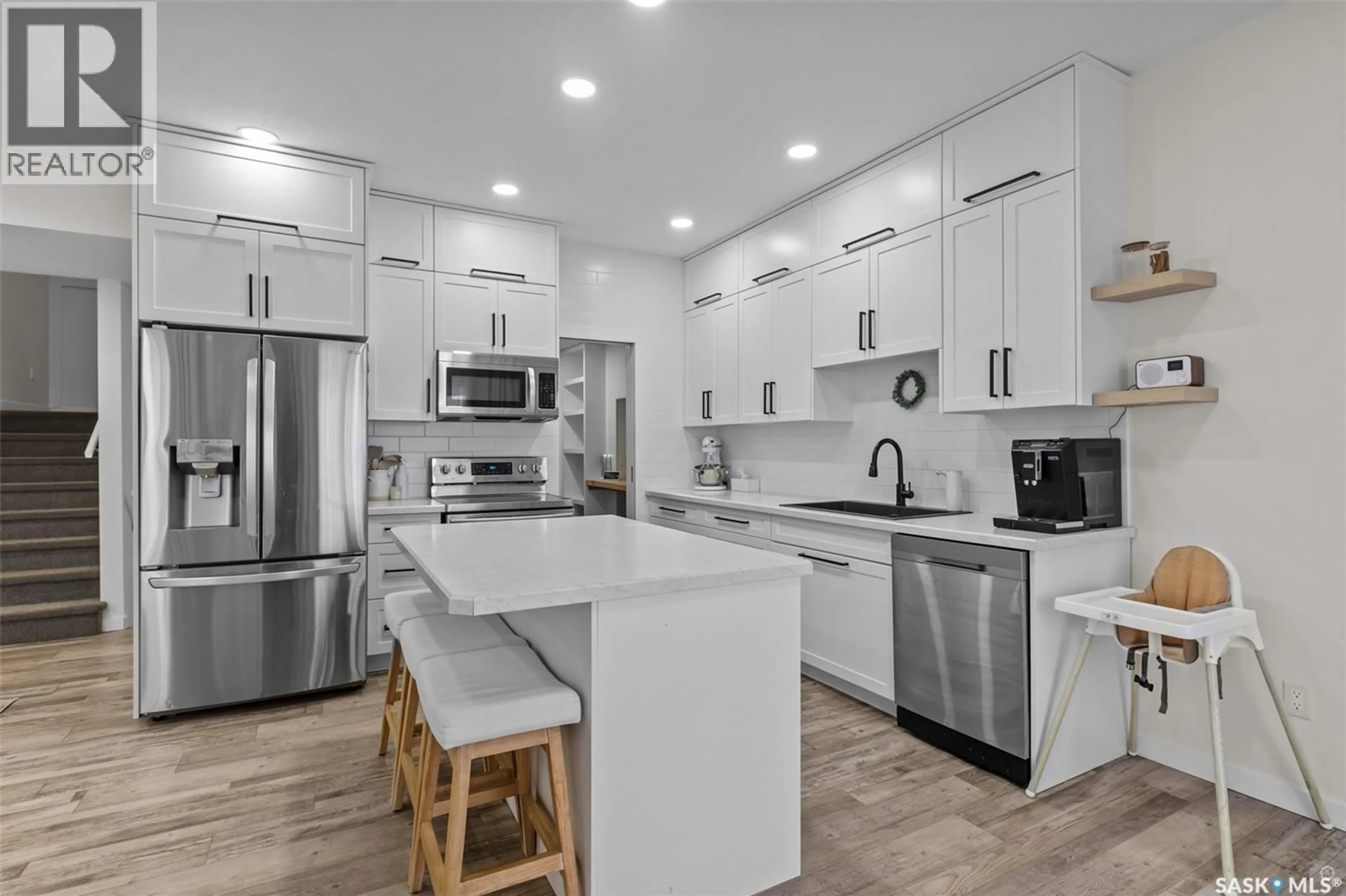 Open concept kitchen, ceramic/tile floor for 744 19TH STREET, Prince Albert Saskatchewan S6V4E4