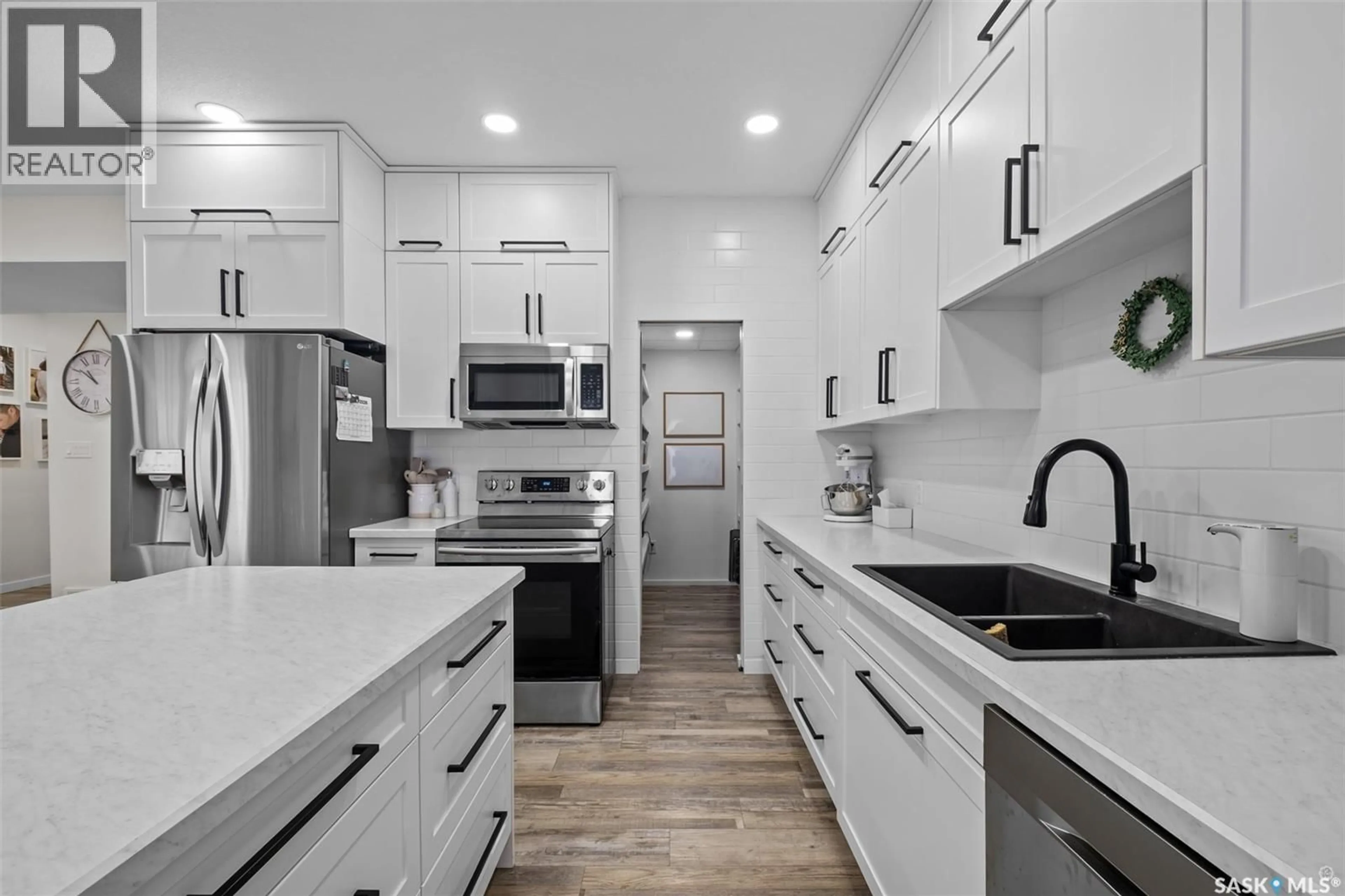 Open concept kitchen, ceramic/tile floor for 744 19TH STREET, Prince Albert Saskatchewan S6V4E4