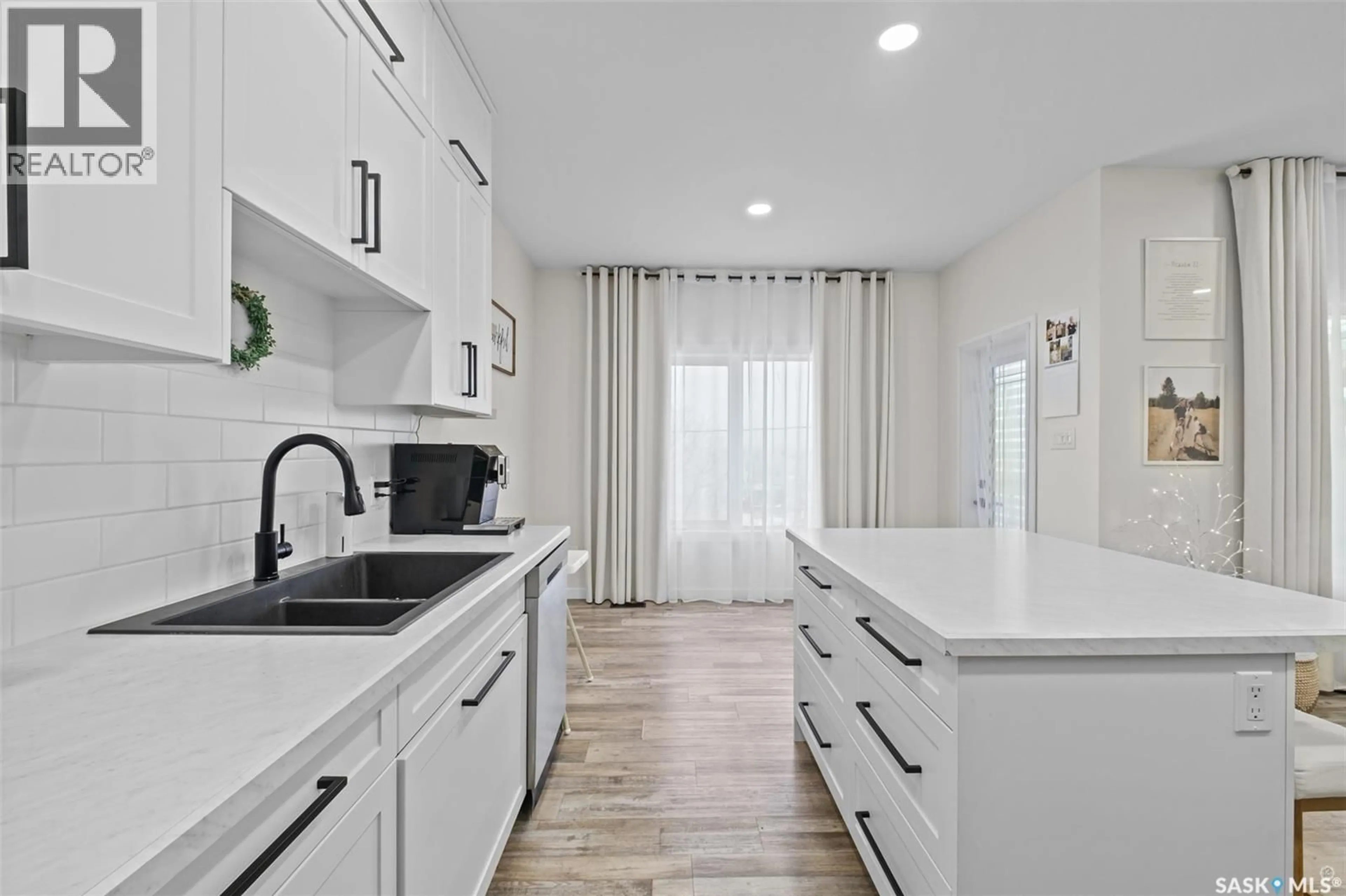 Open concept kitchen, ceramic/tile floor for 744 19TH STREET, Prince Albert Saskatchewan S6V4E4