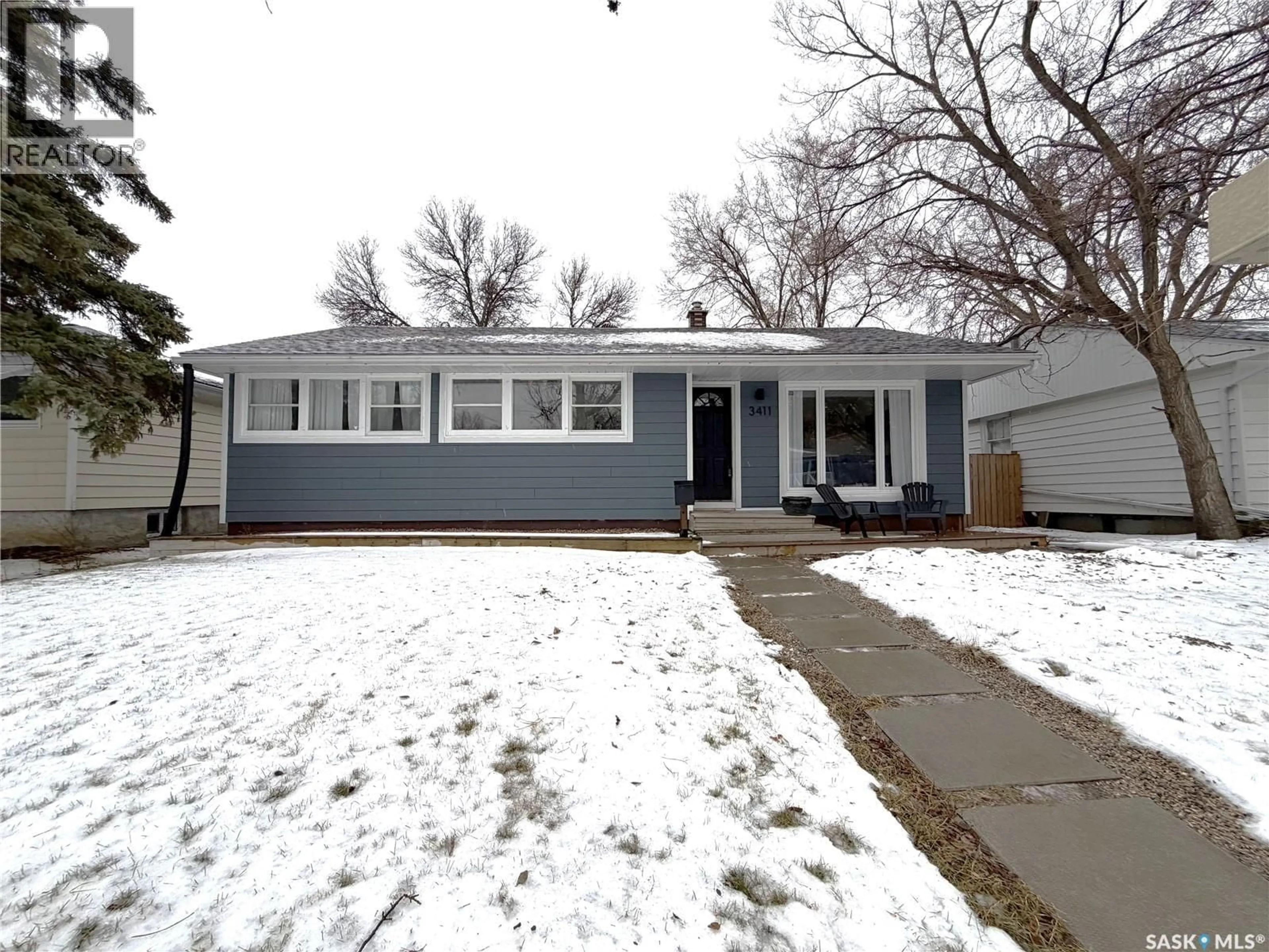 Home with vinyl exterior material, street for 3411 21ST AVENUE, Regina Saskatchewan S4S0T8