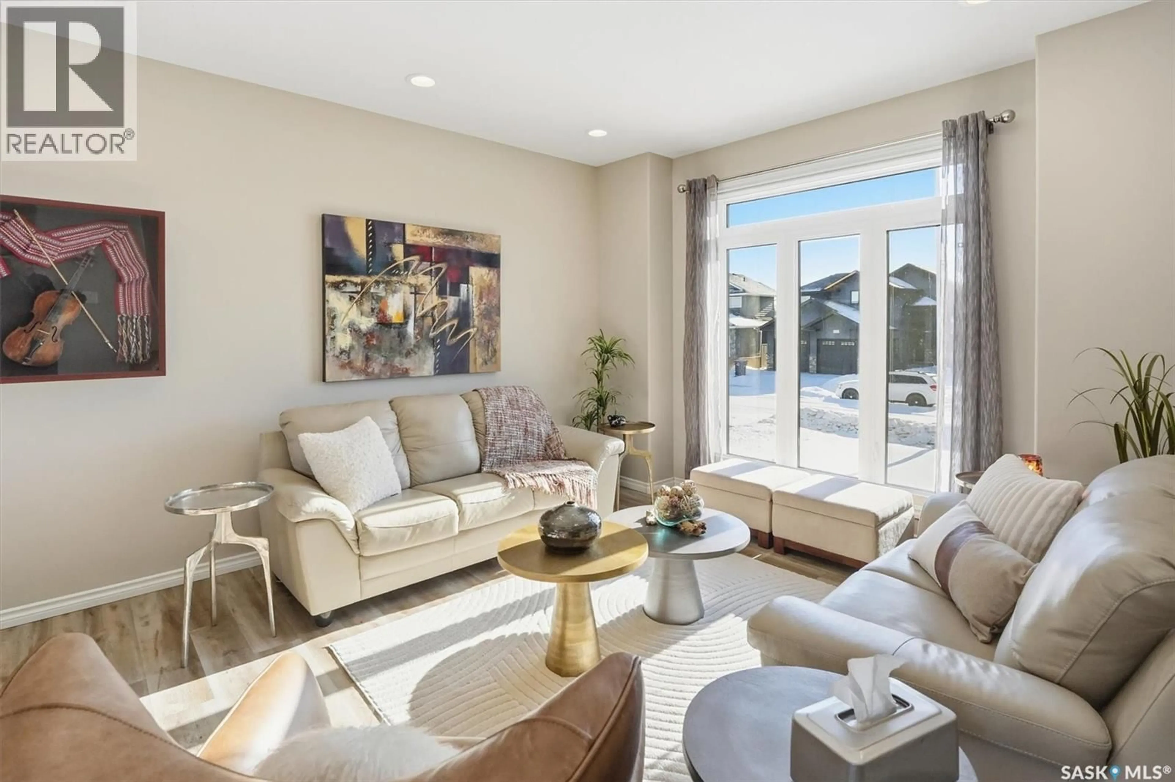 Living room with furniture, ceramic/tile floor for 404 LYLE CRESCENT, Warman Saskatchewan S0K4S1