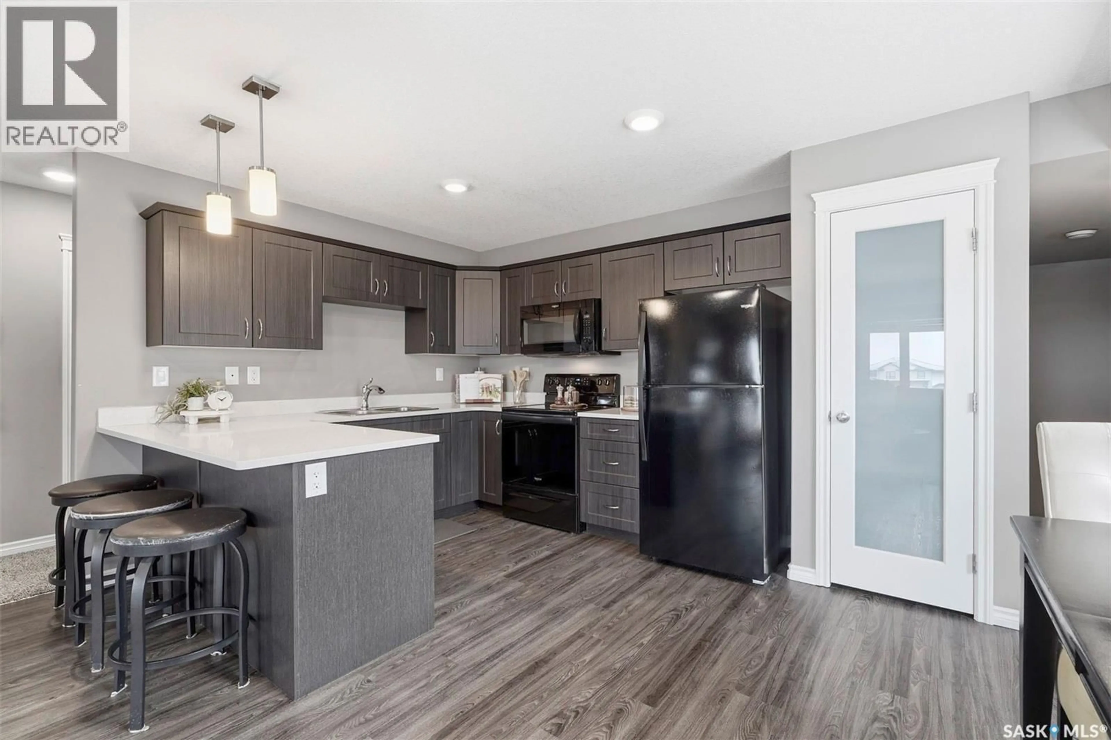 Open concept kitchen, unknown for 507 110 AKHTAR BEND, Saskatoon Saskatchewan S7W0Y9
