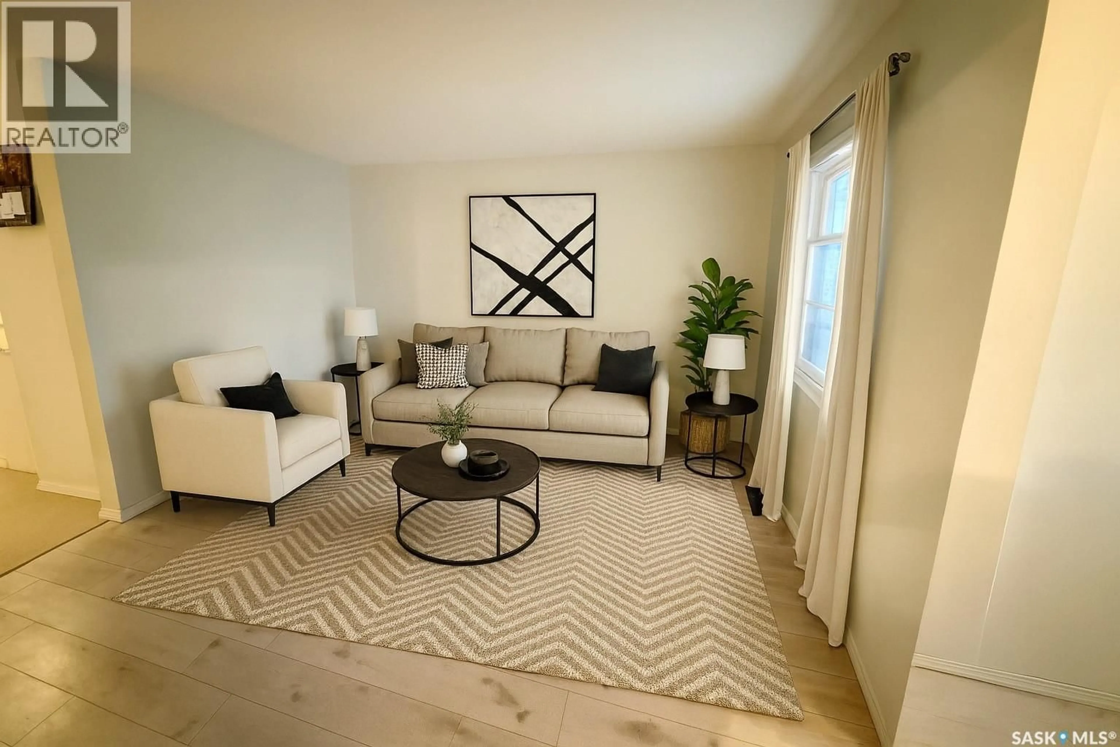 Living room with furniture, carpet floor for 1140 COTEAU STREET, Moose Jaw Saskatchewan S6H5G6