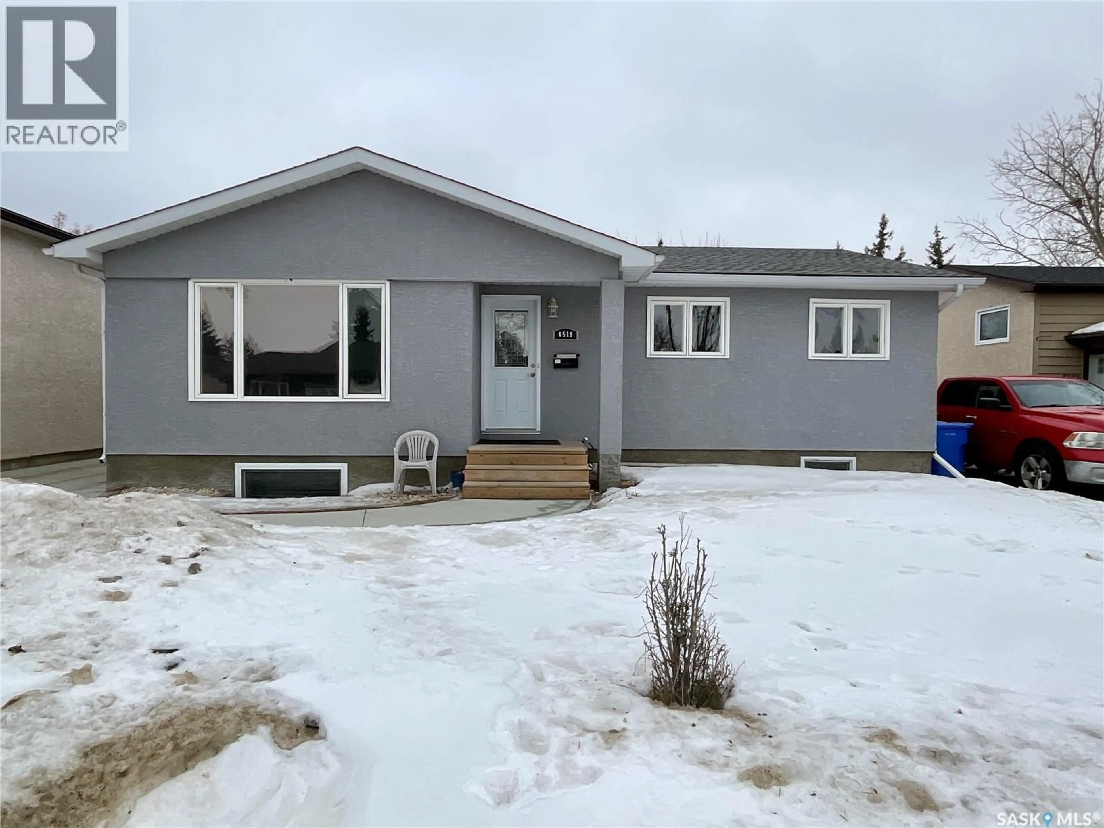 Home with vinyl exterior material, street for 6519 WHELAN DRIVE, Regina Saskatchewan S4X3H7