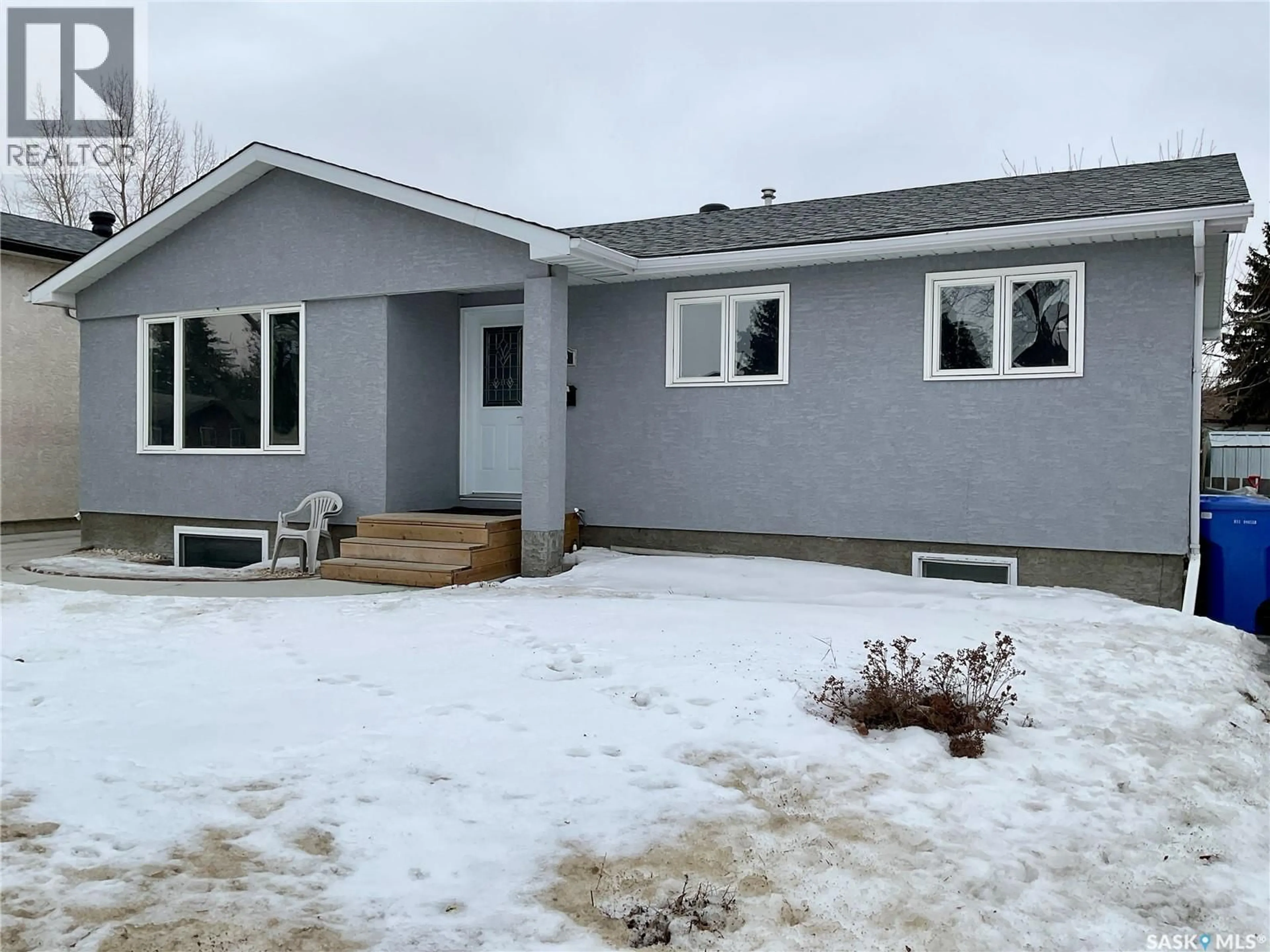 Home with vinyl exterior material, street for 6519 WHELAN DRIVE, Regina Saskatchewan S4X3H7
