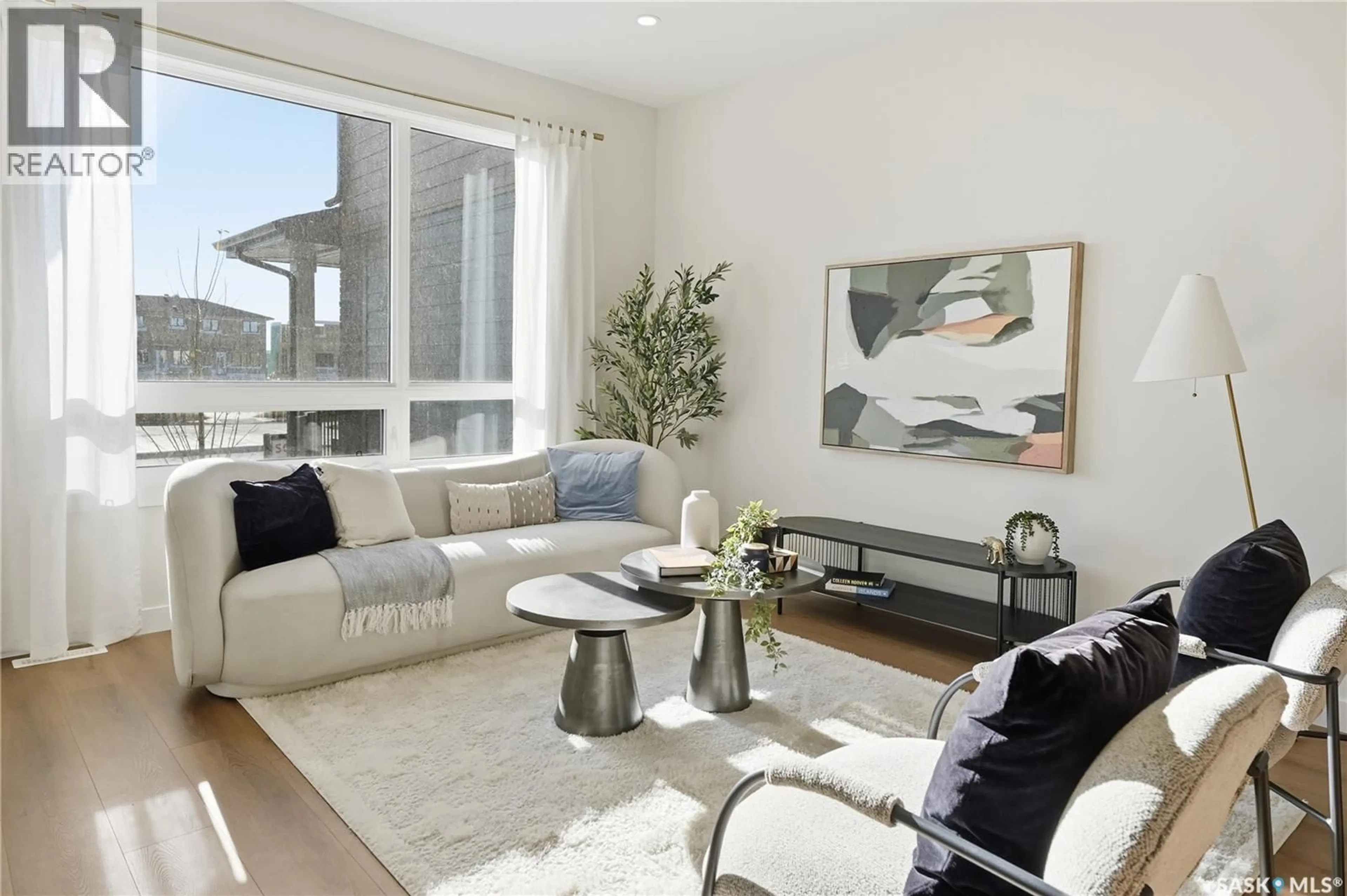 Living room with furniture, unknown for 34 TASKAMANWA TERRACE, Saskatoon Saskatchewan S7V1Z7